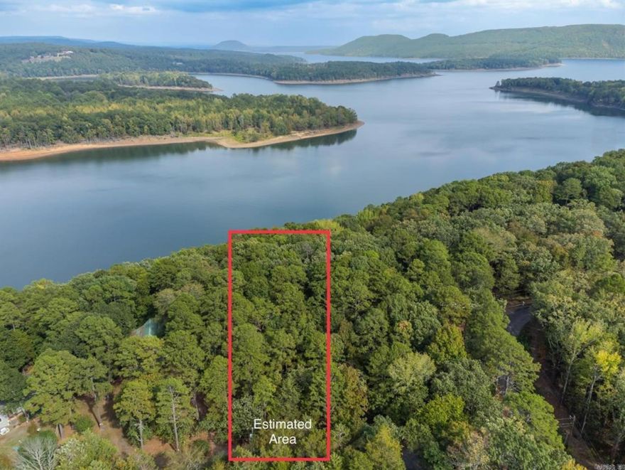 Seasonal view! When leaves fall, gorgeous vista view of cliffs and Greers Ferry Lake get better!! Put on your boots and see it for yourself! Not many lake view lots available. Located ideally in an inlet on Klondike. The unimproved land is shaded by small diameter trees (easy to remove). Paved Road! City Water! Trees separate existing homes. Plenty of space to build before land slopes down toward the water. Build your forever home or Rental Property. Tiny house, RVs and Campers are welcome. (No mobile homes or boat dock.) Perc test has been done. White lines on trees indicate where Army Corp property begins. Minutes from Choctaw Recreation Area, Campground and Marina. Greers Ferry Lake spans 30,0000 acres, it is full recreation - boating, water skiing, swimming, scuba diving and fishing. Record breaking walleye! MUST SEE VIDEO TOUR: https://tinyurl.com/33cup373
