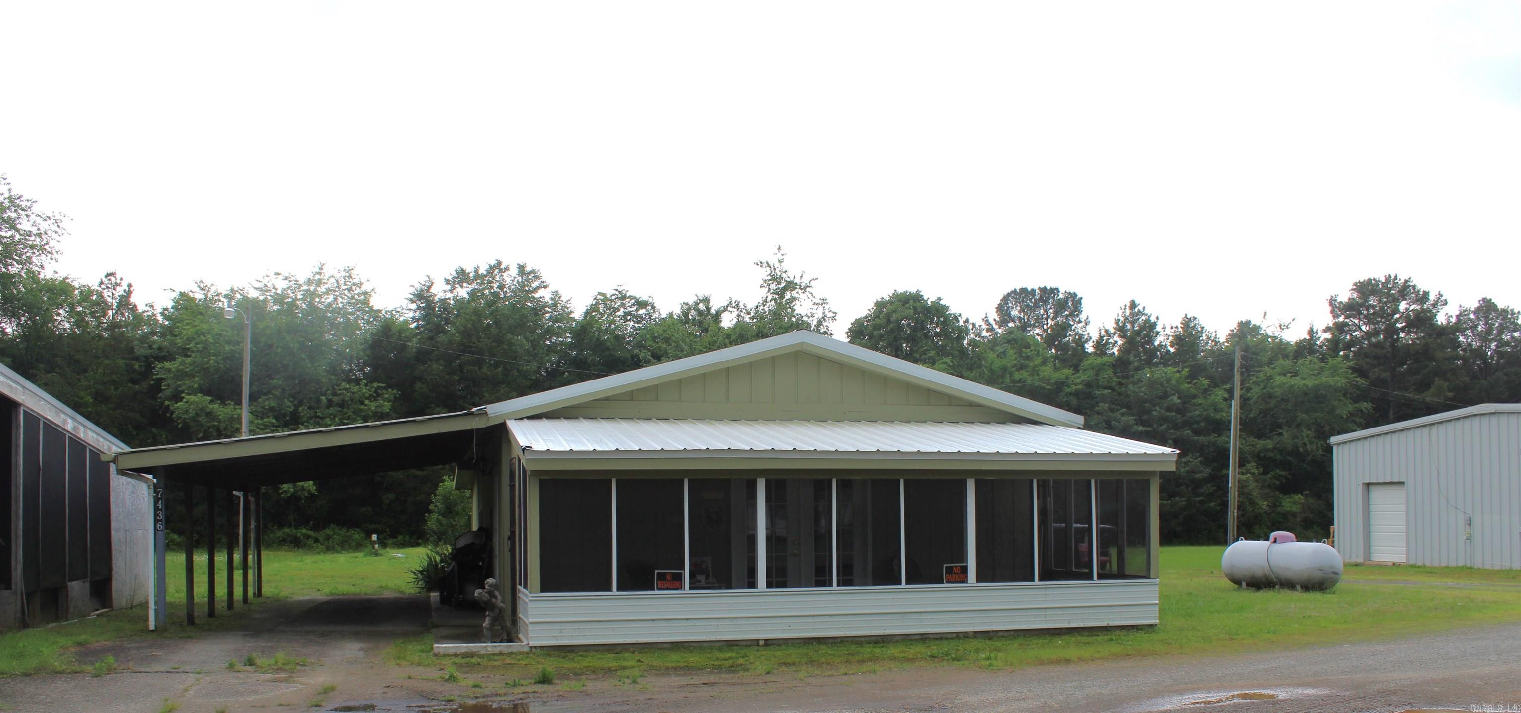 This is a MUST SEE for any & all Investors. House is 1,080 sq ft, has been completely remodeled, 1 bed 1 bath with kitchen, laundry room, and screened in porch and rents for $900. Next door you'll find a 4,100 Commercial building with 4 large offices (appx.1,000 Sq' each) with 1/2 baths in each, two units have been completely remodeled, new electric, plumbing, and sheetrock, two units have roll-up doors in back. 1 Unit has kitchen with 1 bedroom and 1 bath Rents for $500.00. 3 units rent for $400.00 each.