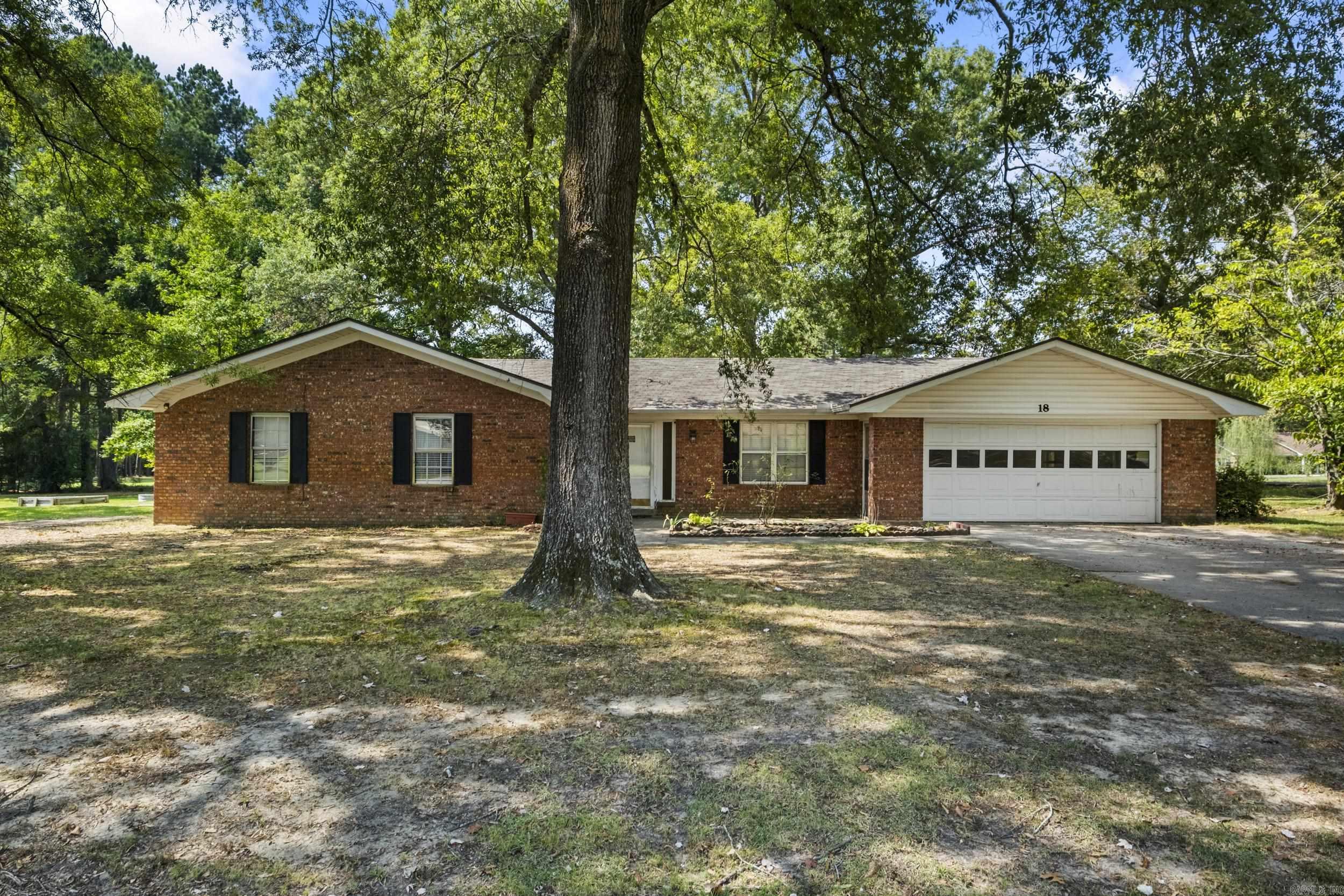 Looking for room to grow in a fantastic location close to everything Conway has to offer-Without breaking the bank? This 4 Bedroom home sits on over an acre and includes a woodburning fireplace and two garage area, giving you plenty of space inside and out. Recent updates include new flooring and fresh paint in several main rooms and a new roof installed in 2024, so the big tickets items are already taken care of. Priced below market value for the area, this property is ready for you to add your personal touch and make it your own. Dont miss this rare opportunity for space, location, and value all in one package! agents see remarks