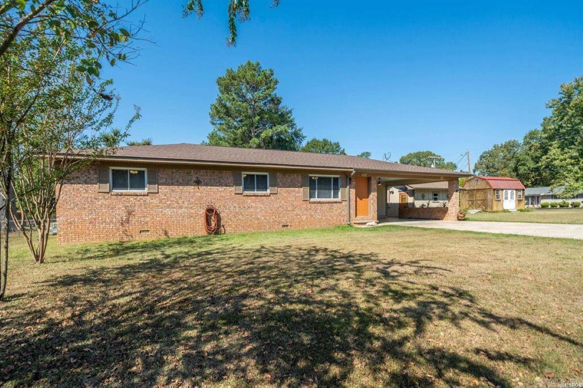 Discover your perfect retreat in this beautifully updated home, ideally located in the Lakeside School District on a spacious corner lot with direct lake access. This charming residence features 3 bedrooms and 1.5 bathrooms, offering 1,476 square feet of comfortable living space just outside city limits. Extensively renovated in 2021, the home boasts a new HVAC system, new wiring throughout, and new textured ceilings. Luxury vinyl plank flooring throughout. Roof is 6-8 months old per seller. The inviting kitchen showcases stunning maple cabinetry, generous storage, a walk-in pantry/laundry room. Step outside to a fenced backyard, perfect for pets and gatherings, with an amazing hot tub providing a private oasis for relaxation. Additionally, the property includes a well-equipped workshop with electricity and an extra storage shed, catering to all your hobby and organizational needs. Included in the sale are a refrigerator, washer, dryer, for a seamless move-in experience. The seller also offers a First American Home Warranty for your peace of mind. With its thoughtful updates, spacious layout, and prime location, this home is an ideal choice for families and nature enthusiasts alike