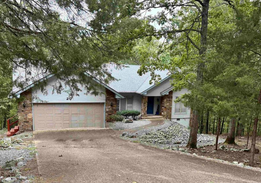 Solid, well-built, custom home with great bones and tons of potential in desirable Hot Springs Village! Featuring an updated kitchen, spacious floor plan, and beautifully landscaped lot. Large crawl space with workshop area provides excellent storage and workspace. Home is being sold "As Is" and will benefit from new flooring, paint, and personal touches to make it your own. Seller is entertaining All reasonable offers. New Buyers will pay $2000 buy-in fee.