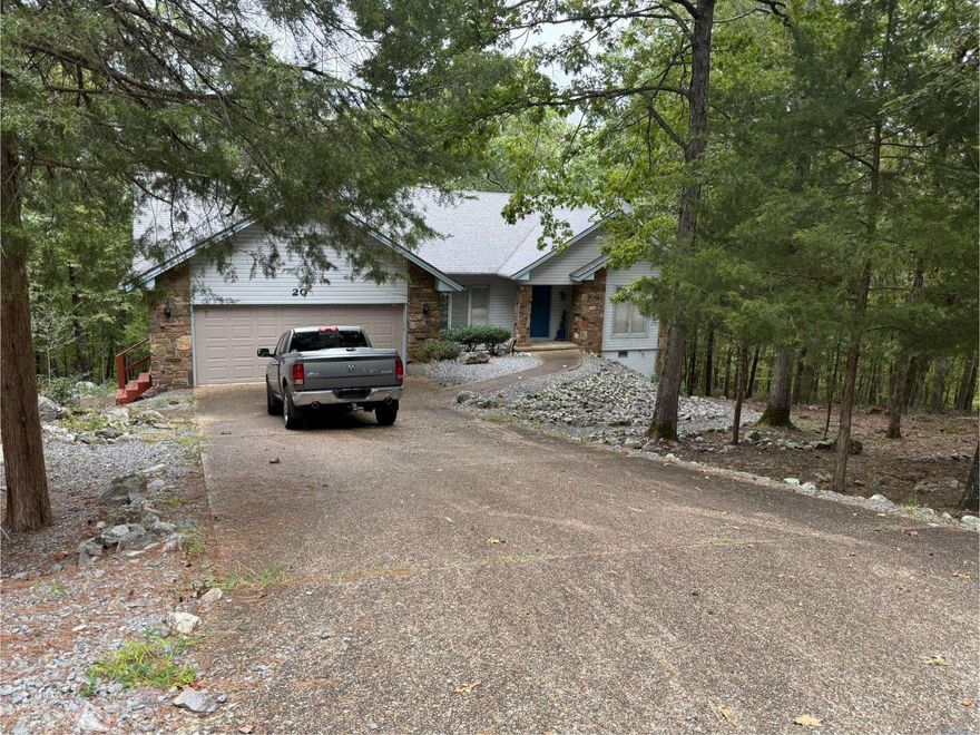 Great Investment Opportunity!! Solid, well-built, custom home with great bones and tons of potential in desirable Hot Springs Village! Featuring an updated kitchen, spacious floor plan, and beautifully landscaped lot. Large crawl space with workshop area provides excellent storage and workspace. Home is being sold "As Is" and will benefit from new flooring, paint, and personal touches to make it your own. Seller is entertaining All reasonable offers. New Buyers will pay $2000 buy-in fee.