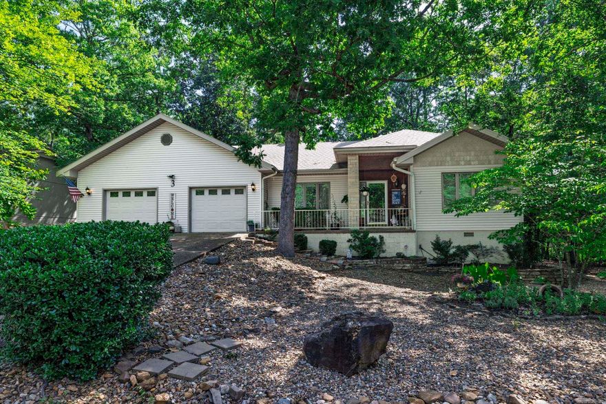 Well-maintained and updated home featuring engineered hardwood flooring and freshly retextured walls with updated paint throughout. The living area offers a gas log fireplace and opens to a light-filled sunroom. A dedicated office is located just off the laundry room. The primary suite includes private deck access and an en-suite bath with its own water heater. Enjoy a spacious wraparound deck with multiple access points from the primary bedroom, office, and sunroom. Additional features include a fenced backyard, whole-house VAC system, and an oversized two-car garage. Conveniently located near the new Dollar General Market for added everyday ease. Modified for VA approval in 2008 allowing you to age in place. Roof 2015. SEE AGENT REMARKS.