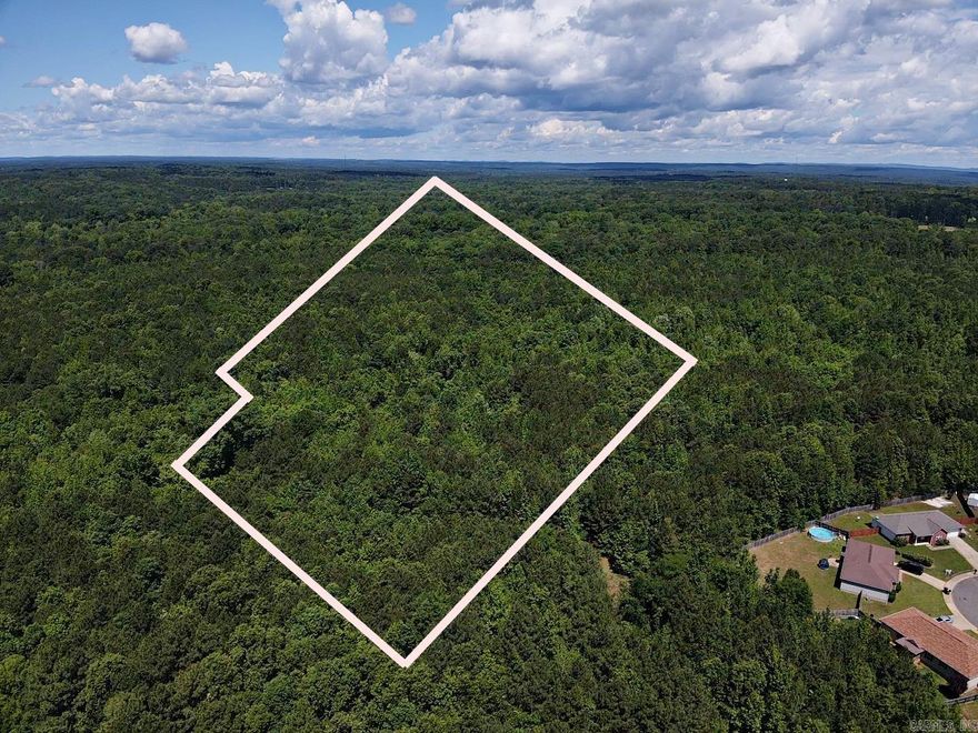Very nice parcel of timber land close to Walmart and I-30.  Great opportunity for development. Utilities available but currently not on the land. New survey available.