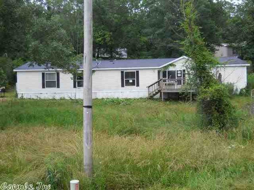 Country Living at its Best!!! This spacious 4 bedroom 3 bath home is only 10 minutes from Lake Hamilton and features two living areas, a split floor plan, an office, and a huge master bathroom.  Don't miss out on this great country home!!  Sq. footage and acreage taken from the tax records.  Utilites will be the responsibility of the buyer for inspections.  See agent remarks.