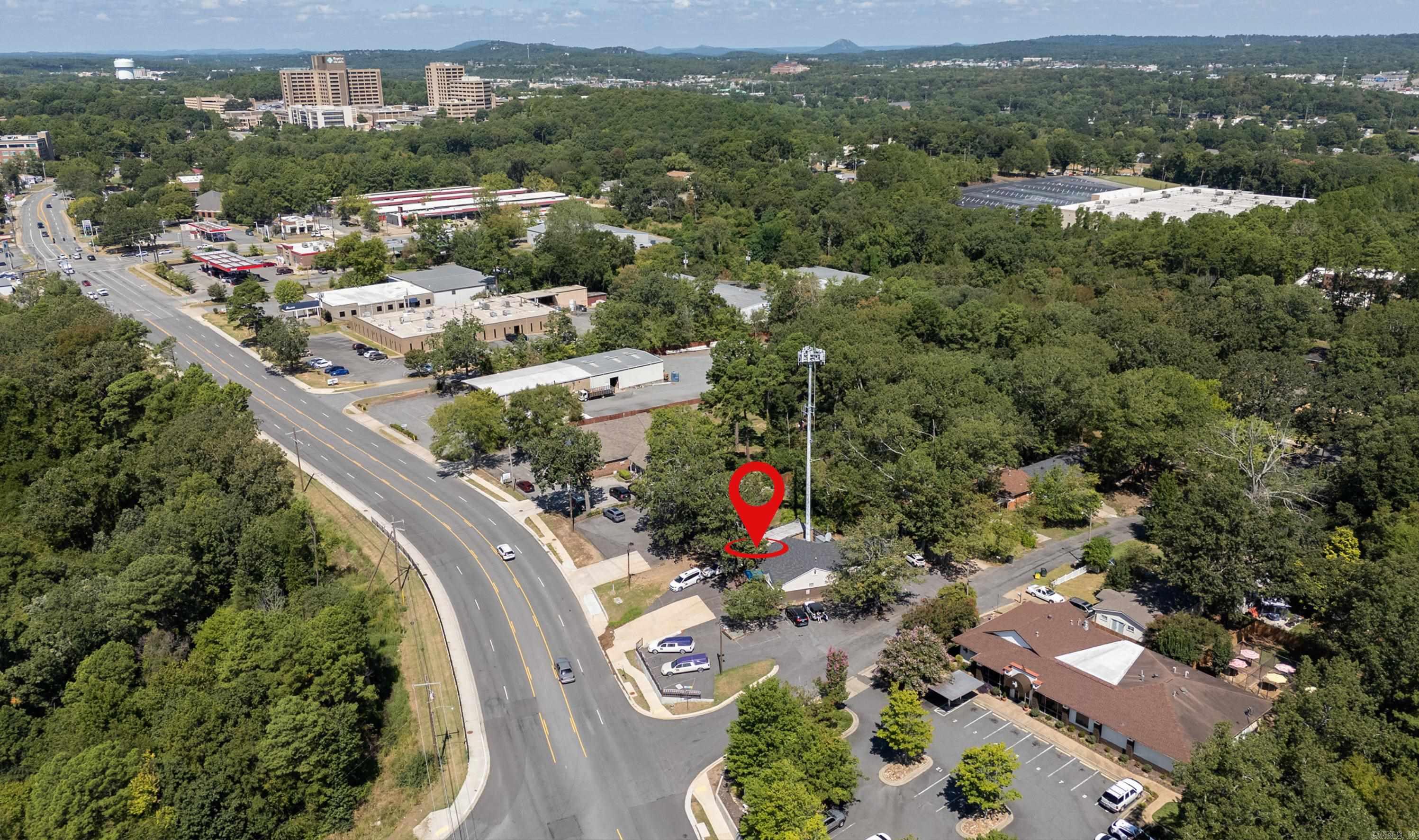 8424 Kanis Road Little Rock 72204. Prime Location Commercial Property. 2 Monthly Sources of Income. Verizon Cell Tower and Business Operating in Building. 66 FT of Hwy Frontage. 18k Daily High Traffic Count. Parcel is 0.27 Acre measure for accuracy on Corner Lot with Parking Spaces. Business Building offers 1,765 SQFT approximately, measure for accuracy and is in great condition with updates. Minutes from Baptist Medical Center and I-630. For more details contact Vicki.