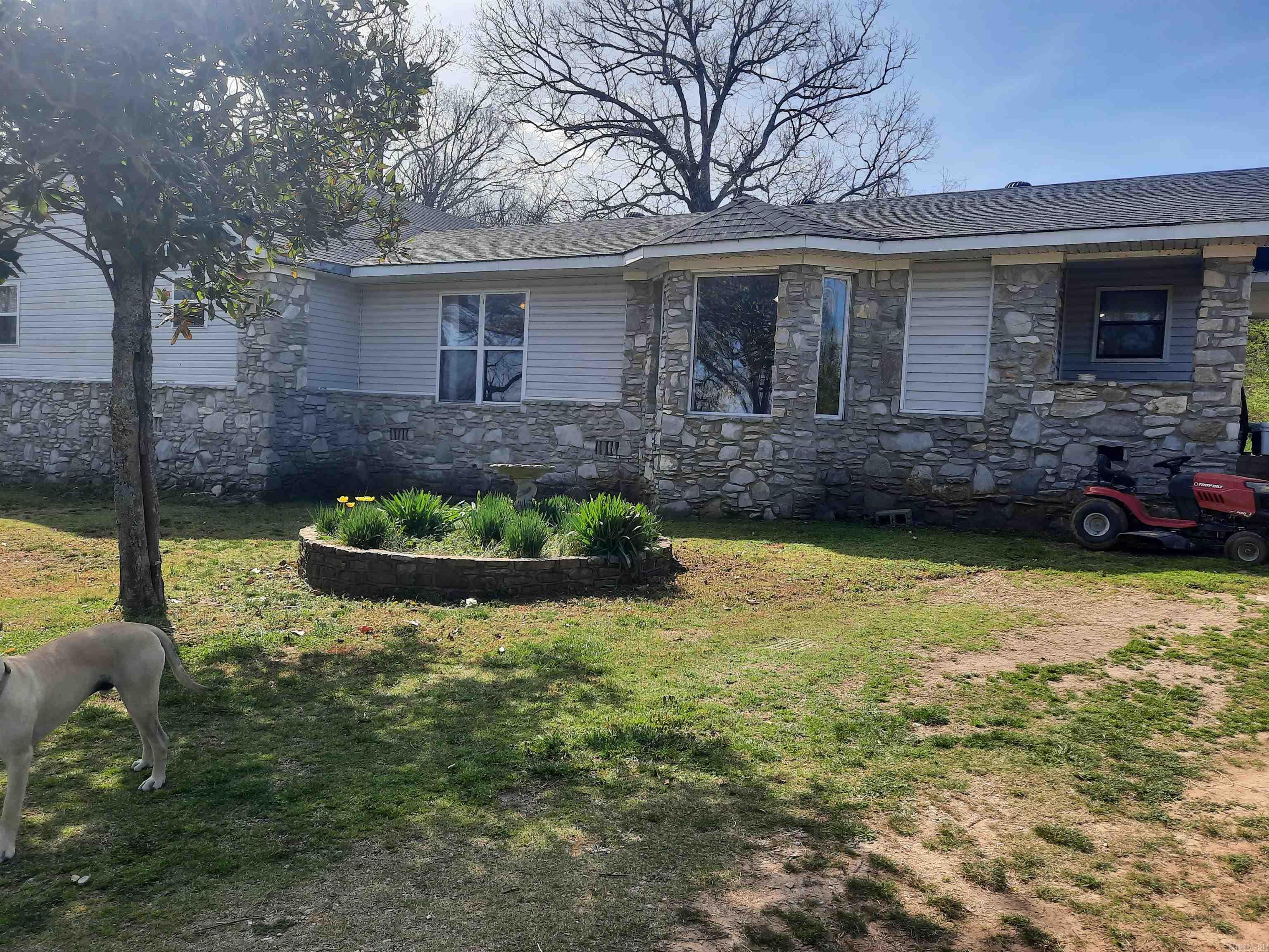 Spacious home conveniently located, short distance out side town, paved road frontage. 4 bedroom 2 1/2 bath, CH&A, open floor plan, large primary bedroom and bath, plus large deck to sit and enjoy your morning coffee.