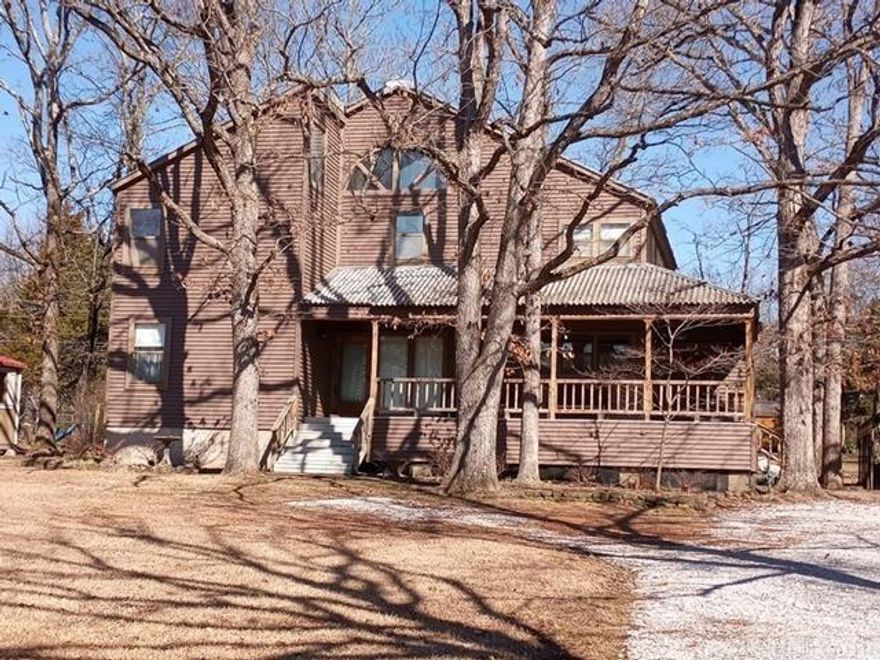 2 bedroom 2 bath home in city limits. Woodburning fireplace and wrap around front porch. Storage shed will convey