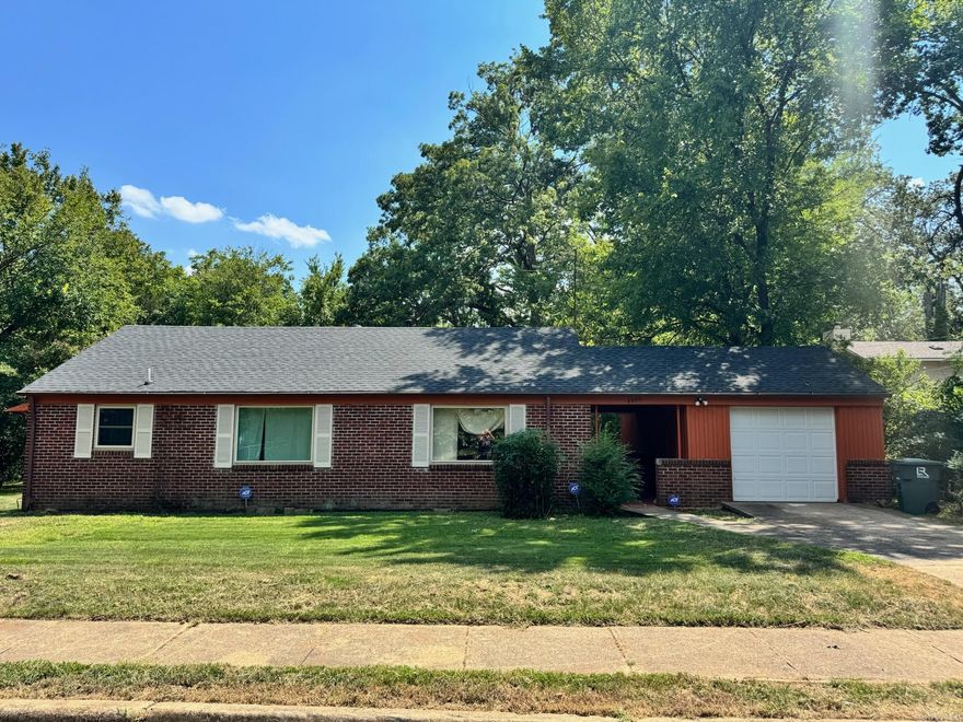 Renovated Charmer with Room to Finish in Little Rock’s family friendly Oak Forest!  This updated 2 Bed 1 Bath has a brand new roof, new HVAC system, and new appliances.   From the garage’s porte-cochère, you’re welcomed inside to find your spacious living with the new luxury vinyl tile floors, fresh paint, and new light fixtures throughout.   The flooring includes a stylish blend of new luxury vinyl and original hardwoods, giving a warm and character-filled vibe that’s ready for your personal touch.