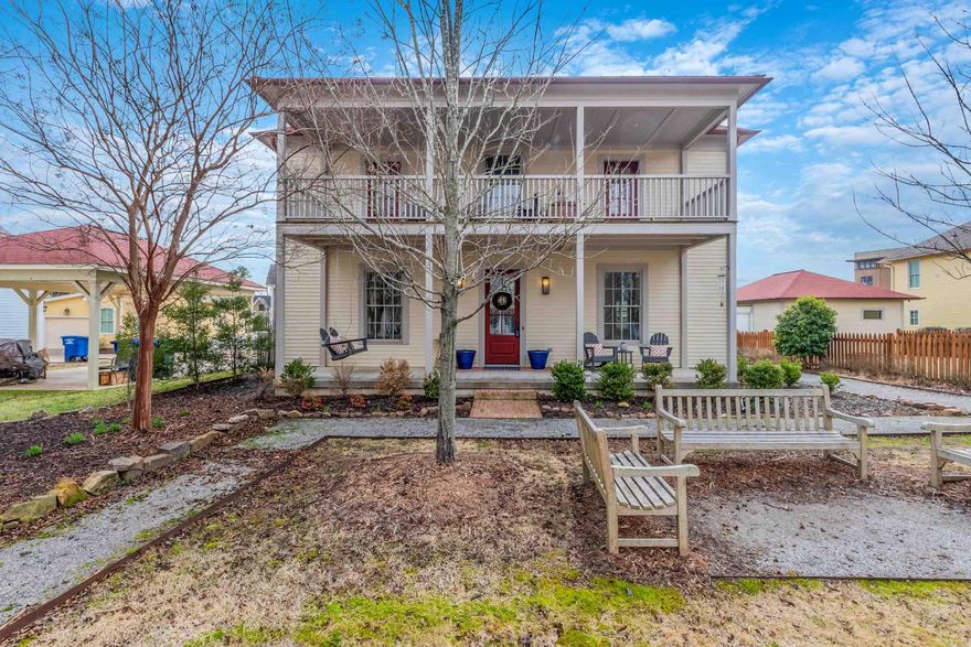 Welcome to this charming two-story Charleston style cottage home nestled in The Villages at Hendrix! This meticulously crafted residence offers a perfect blend of traditional design and modern amenities. As you enter the property, you're greeted by a warm and inviting living space featuring hardwood floors, woodwork, and plenty of natural light streaming through the windows. The open-concept layout seamlessly connects the living area to the gourmet kitchen, creating an ideal space for entertaining guests or enjoying cozy evenings at home. The kitchen boasts granite countertops, stainless steel appliances, ample cabinet space, and a gas range & stove. A convenient half-bath is located just off the kitchen for added convenience. Venture upstairs to discover dual primary bedrooms, each with its own ensuite for ultimate privacy and comfort. Both bedrooms have access to an oversized shared balcony, where you can savor your morning coffee while taking in the serene views of the neighborhood. Outside, a charming porch beckons you to relax and unwind, while the low-maintenance yard allows for more time to explore the nearby shops & restaurants within walking distance. Agents see remarks$*