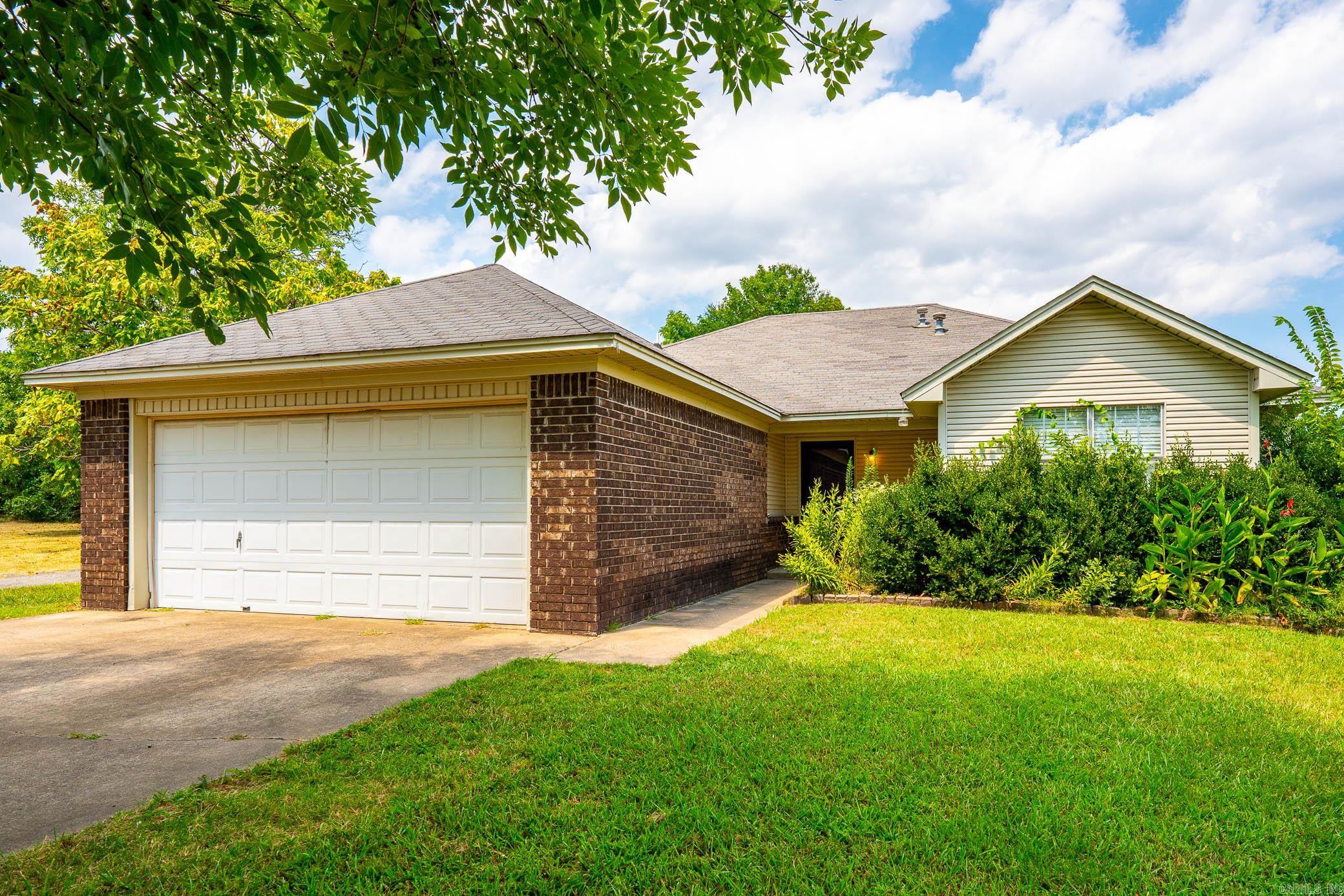 RARE FIND IN WEST CONWAY. 3/2 HOME ON 1.45 ACRES WITH A 41X41 (1,681 SQ FT) METAL BUILDING THAT HAS ELECTRICITY AND THREE (3) OVERHEAD DOORS WITH THE MIDDLE DOOR BEING TALL ENOUGH FOR AN RV. MULTIPLE OPTIONS FOR THIS PRIME LOCATION. CONSULT CONWAY PLANNING OFFICE FOR POSSIBLE ZONING OPTIONS. **AGENTS PLEASE SEE ALL REMARKS *