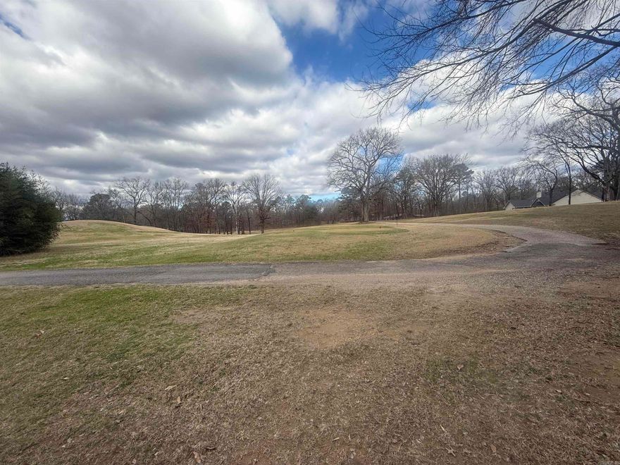 Rare opportunity to own a golf-front lot on the 17th hole tee-box of Diamondhead Golf & Country Club in Diamondhead, Arkansas. This desirable homesite offers beautiful fairway views, a peaceful setting, and the perfect canvas to design your custom dream home. Whether you’re seeking a primary residence, vacation retreat, or investment property, this lot delivers location, lifestyle, and long-term value. Diamondhead is a private, well-established golf community offering a relaxed yet active lifestyle. Residents enjoy access to the 18-hole Diamondhead Golf Course, clubhouse, swimming pool, tennis and pickleball courts, walking areas, and social activities. The neighborhood is ideal for golf enthusiasts, retirees, families, and remote professionals seeking tranquility with convenience. Located just minutes from Hot Springs, Lake Catherine State Park, boating, fishing, dining, shopping, and medical facilities, this property blends natural Arkansas beauty with everyday accessibility. Enjoy resort-style living, scenic surroundings, and the freedom to build at your own pace in a community designed to fit a variety of lifestyles.