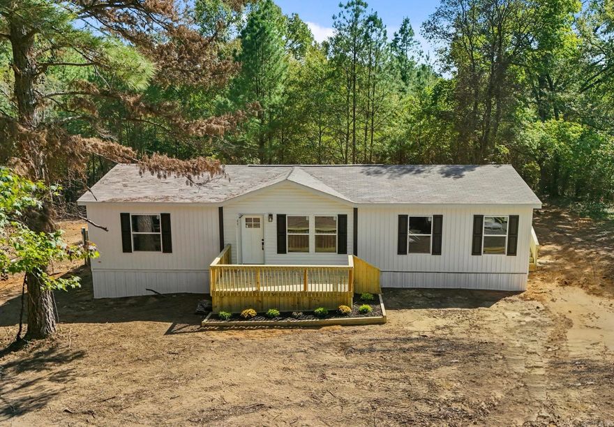 Brand-new and move-in ready! This double-wide on a permanent foundation qualifies to be financed. Sitting on 1.5 acres, it offers three spacious bedrooms, two baths, and an open-concept layout. The gourmet kitchen features stainless steel appliances and high-end fixtures, perfect for entertaining. Don’t miss this opportunity—schedule your showing today!