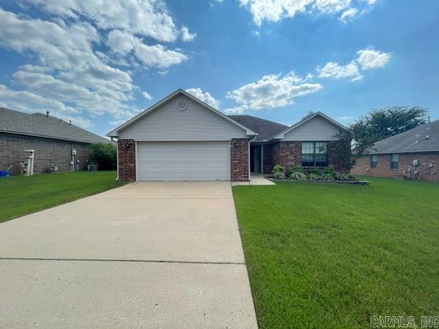 Recently renovated home perfect for an investor (current tenant under lease) or for a homeowner.  Neighborhood pool and playground. Located near elementary and middle schools, shopping, restaurants, and interstate.  New roof, new window blinds, newly painted cabinets with new hardware, new light fixtures, new flooring, new dishwasher.  Small covered back porch with patio.  Partially fenced.