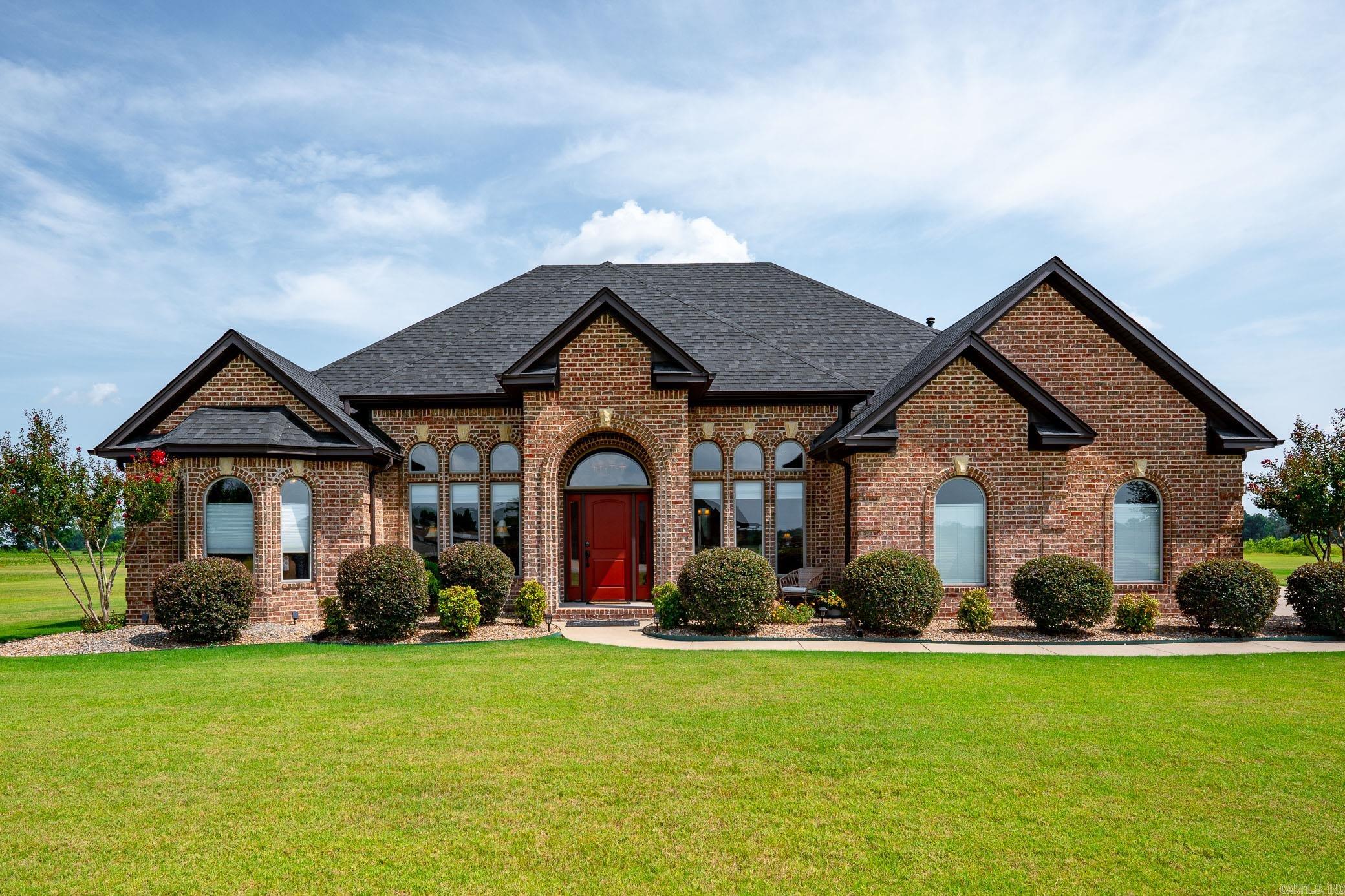 ASHLEY'S DOWNS IS A GATED NEIIGHBORHOOD. A PERFECT SITTING ON 1.62 ACRES. A PRIVATE ACCESS TO HORSESHOE LAKE, 33 ACRE GREENBELT. FOUR BEDROOMS AND THREE FULL BATHS. PLUS, AN OFFICE. SPLIT FLOOR PLAN. BEAUTIFUL LARGE CROWN MOLDING. THE EAT IN KITCHEN WITH SLAB GRANITE AND NATURAL GAS RANGE WITH VENTAHOOD. BEAUTIFUL TILE BACK SPLASH AND PANTRY. AN INVITING FORMAL DINIING WITH 12' CEILINGS. LIVING AREA WITH 15' CEILINGS . THE VENTLESS FIREPLACE. BUILD INS GALOUR. HUNTER DOUGLAS PARASAIL WINDOW COVERINGS. PLUS, A SPETACULAR 30 X 34 DETACHED BRICK BUILDING HEATED AND COOLED THAT MATCHES THE HOUSE WITH AN INDOOR GUNITE CONCRETE POOL 9 X 16, JULY 2022 NEW ROOFS WERE INSTALLED ON HOUSE A SPECTACULAR BRICK BUILDING, ENCLOSED BACK LANAI AND PATIO , FRONT SITTING PATIO
