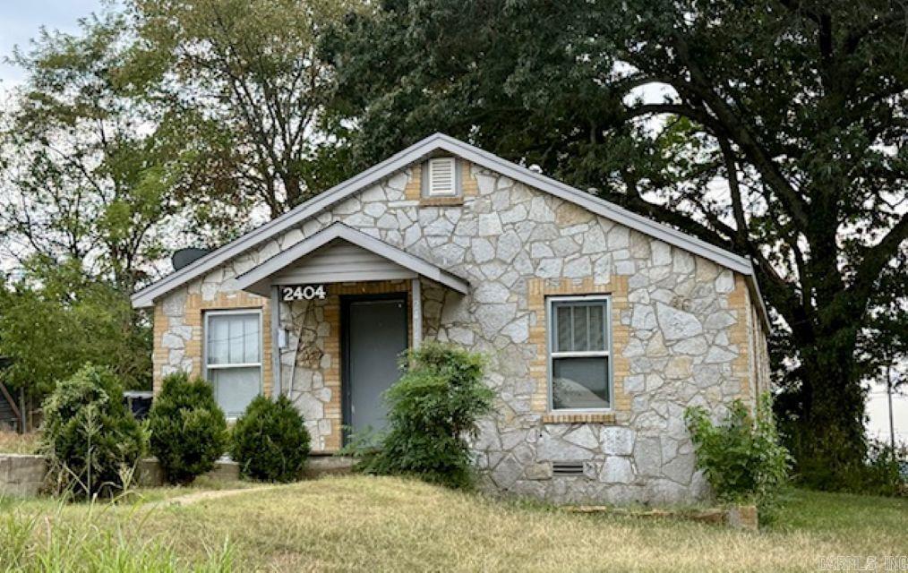 NEXT TO EVERYTHING FOR NEXT TO NOTHING! Located within minutes of Lyon College or downtown this 2-bedroom, 1- bath home is the perfect INVESTMENT OPPORTUNITY! Nicely situated on a corner lot with several updates completed, this property is EASY to OWN. Spacious living room that opens to an updated galley kitchen that is efficiently designed to make every square inch count. Need more storage space? The detached storage building helps to keep everything handy but out of sight. IT ALL ADDS UP, CALL TODAY!