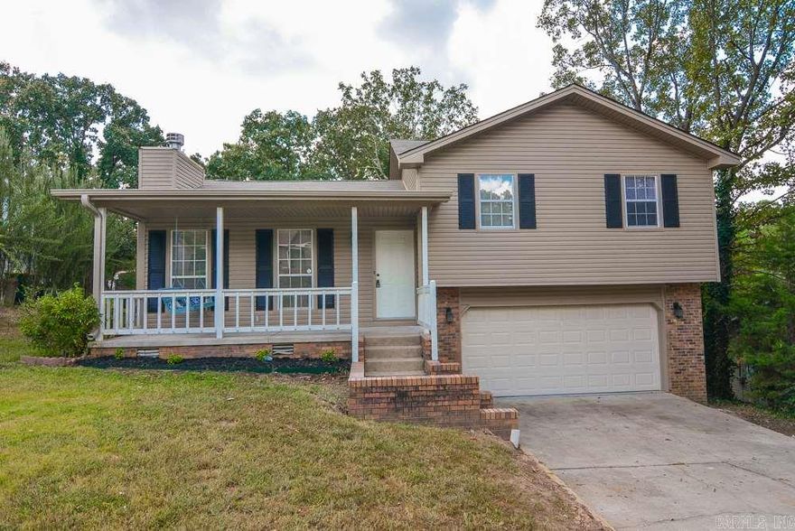 This home has excellent curb appeal, a big inviting front porch with relaxing porch swing for those cool fall days. Large great room with vaulted ceilings and wood burning fireplace. Kitchen is open to the dining area and living room. All new interior paint and carpet. All wood trim and wood cabinets has been sanded and refinished. Refrigerator stays. Brand new roof, gutters, and shutters. Updated fixtures. Oversized 2 car garage. Huge backyard with deck.  Close to great area amenities and recreational fun.