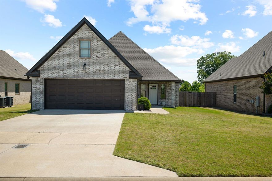 Checkout this awesome 4-bedroom, 2-bath brick home built just 5 years ago and loaded with features designed for comfort and entertaining! Enjoy the privacy-fenced backyard complete with a cozy fire pit, covered porch, and oversized patio perfect for relaxing evenings or hosting family and friends. Inside, the spacious kitchen features granite countertops, stainless steel appliances, breakfast bar seating, abundant cabinetry, and plenty of prep space for family dinners or gatherings.  Other amenities include a separate laundry room, two car garage, and a safe room in the garage. The oversized primary suite offers a true retreat with a tiled shower, jetted soaking tub, double vanities with granite countertops, and a large walk-in closet. This move-in ready home combines modern style, functional space, and outdoor living all in one package. Call or text today to schedule your tour and make this beautiful house your next home address!