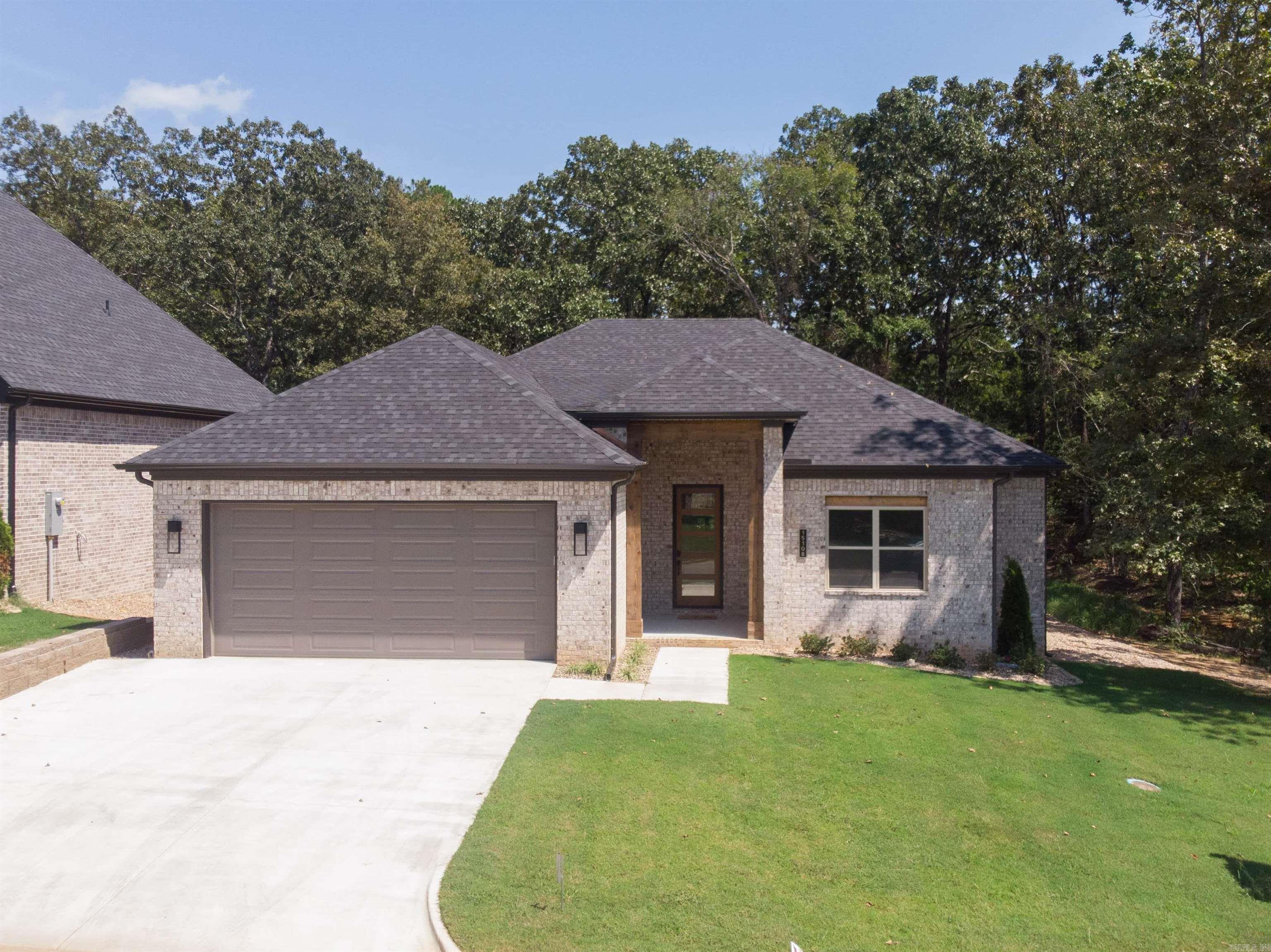 Welcome to 15108 Matterhorn Loop! This home has a green space privacy! This move in ready home is located in the desirable Phase 2 of Stonebrook. Stonebrook was Voted AY Magazines Best Neighborhood in Central Arkansas! Enjoy gated privacy, scenic walking trails, a private lake, and community amenities in one of the most sought-after neighborhoods in Maumelle! Spanning 2,339 square feet, this beautifully designed residence offers the perfect blend of comfort, luxury, and natural beauty. Boasting 4 generously sized bedrooms and 3 full bathrooms, this home is ideal for families or those who love to entertain. The thoughtfully crafted layout includes a spacious open-concept living area, a gourmet kitchen with premium finishes, and large windows that fill the space with natural light. Set on a prime lot, this home offers unparalleled outdoor living with green space behind and a stunning waterfront view of the pond. Whether enjoying a morning coffee on the patio or hosting gatherings, the serene backdrop creates the perfect oasis. Set up a self guided tour of this home on the Hines Homes website.