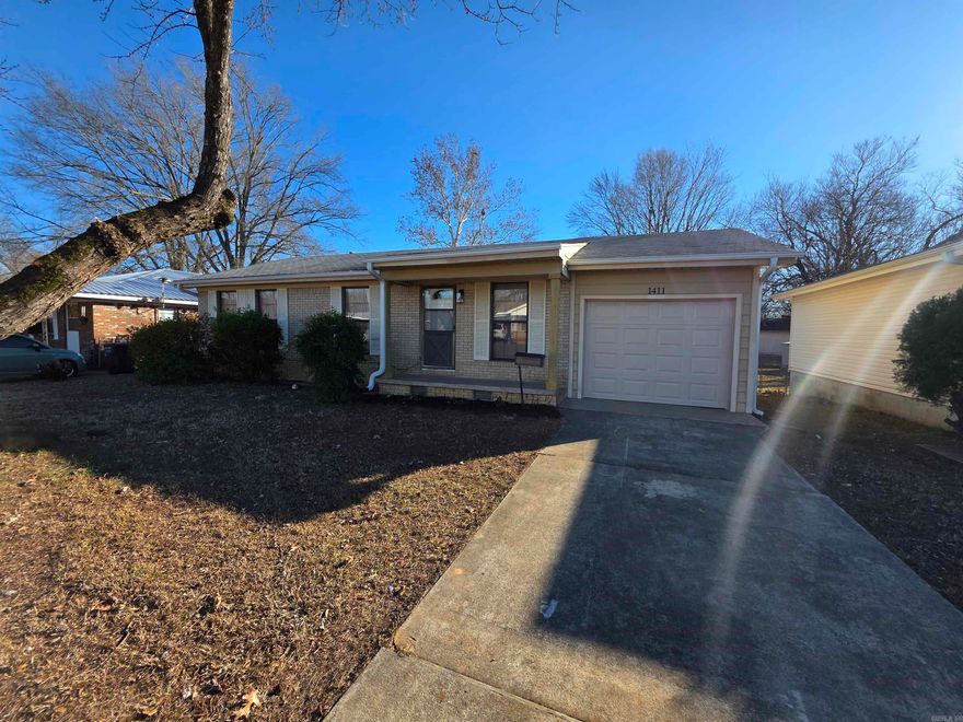 Welcome to your charming 3-bedroom, 1-bathroom home in the heart of Jacksonville! This beautiful home features updated paint and flooring throughout, creating a fresh and inviting atmosphere. The cozy kitchen is perfect for preparing meals and gathering with loved ones, while the spacious living areas provide ample room for relaxation and entertainment.  Step outside to discover a generous backyard, ideal for outdoor activities, gardening, or simply enjoying the Arkansas sunshine. The huge deck is perfect for hosting barbecues or unwinding after a long day, making it an entertainer's dream.  Conveniently located near the Air Force Base, this home offers easy access to shopping, dining, and a variety of local amenities. Perfect for a Family or Roommates