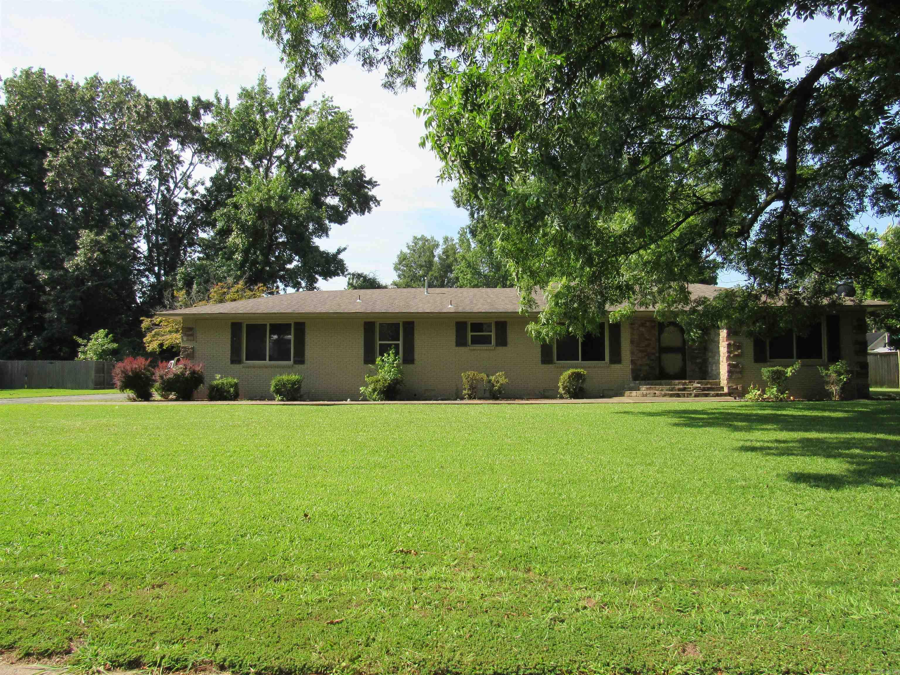 SOLD AS IS this is a beautiful home that sit on a well maintained & tree shaded lot, 2 Car Carport in rear, Long driveway, Storage Building, this house has it all 4 Bedrooms, Sep Dinning Room, Large Kitchen with Island, Open up to Large Great room with Fireplace & Bookcase, lots Of windows thought out house with Blinds, Master offers large Bath with bonus area and a large Den or Game room that has a full bath & Bonus area that could be another kitchen don't let this beauty pass you by. There multiple offers on this house so summit your Highest & Best.