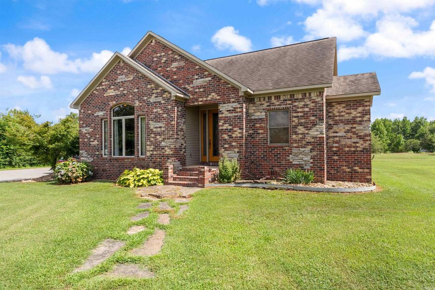 Peaceful, private, and packed with possibility—this 2.5-acre property features a custom, 1710 single-level home, a fully finished, 1950 sqft guest house, and a dream 40x60 shop. The main home boasts an open layout with vaulted ceilings, hardwood floors, granite countertops, and charming touches like ceiling tins and a faux fireplace along with 2 bedrooms and 2 full bathrooms. The spacious primary suite includes dual walk-in closets, a custom-tiled shower, and an adjoining office/nursery with exterior access. The detached guest house offers a full kitchen, laundry, bonus room with balcony, and handicap-accessible features along with a large bedroom and two bathrooms, including one that doubles as a safe room. Outdoors, enjoy a courtyard-style backyard, mature landscaping, and full perimeter fencing. The insulated shop - which includes a paint booth - is perfect for hobbyists or home-based businesses. Hardy wood-fired boiler, Pella windows/doors, and mini-splits throughout. This home is truly has so many features, too many to list! Located minutes from Vilonia, Beebe, and Cabot, with scenic views and space to spread out. It truly is a dream home! Schedule your private showing today!