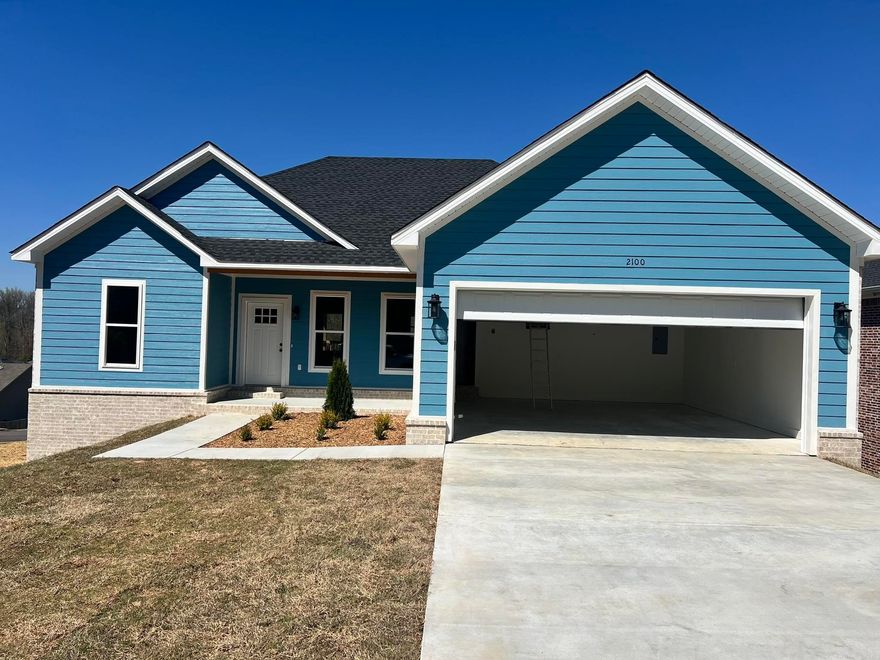 Beautiful 3BR/2BA home with quartz countertops, custom cabinets, stainless steel appliances, and luxury vinyl plank flooring.
