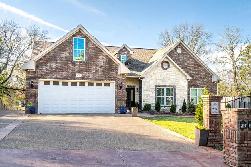 Beautiful 2018-built 4 bedroom, 2.5 bath home offering a total of 2,463 sq ft of comfortable living space. This home features spacious rooms throughout, a charming mini bar, and stunning ceramic wood look flooring. The open-concept dining and living area showcases a cozy fireplace and large windows that fill the space with natural light. Enjoy outdoor living and entertaining on the covered back patio overlooking a large, private backyard. The property also includes a covered detached veranda and an exterior building—perfect for storage or hobbies. Nestled in a quiet neighborhood yet conveniently located near the bypass, airport, Walmart, and popular restaurants, this home truly has it all.