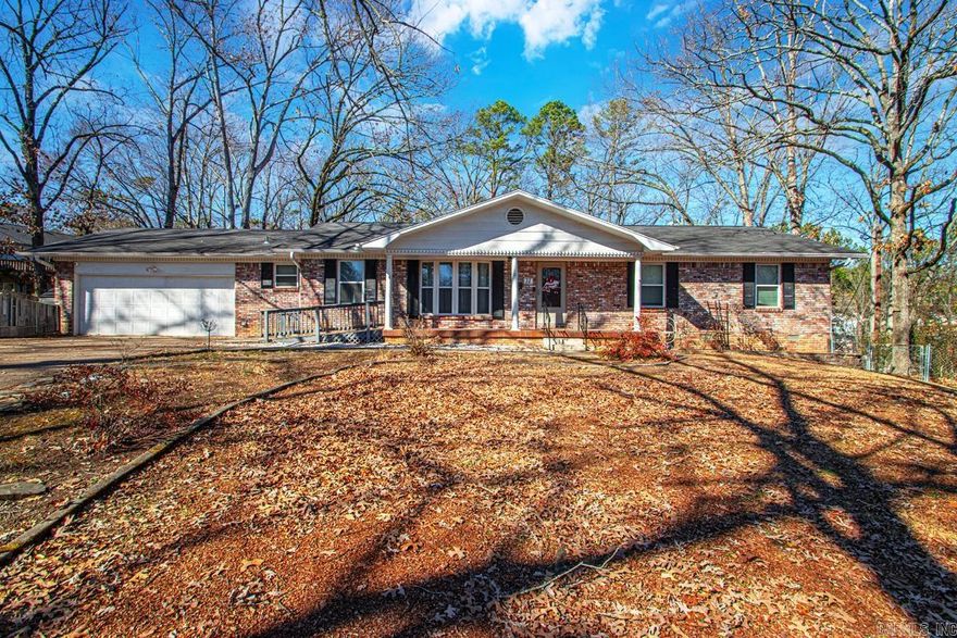 Tucked away on a quiet cul-de-sac in established West Little Rock, this beautifully updated home offers space, privacy, and everyday convenience in one exceptional package. Set on a generous, wooded lot, the backyard feels like a private retreat, perfect for relaxing evenings, entertaining, or simply enjoying the natural setting.  Inside, the home features five bedrooms and three full baths with a layout designed for both connection and flexibility. Most of the main living spaces are located on the upper level, offering inviting gathering areas, abundant natural light, and thoughtful updates throughout. The lower level provides a comfortable retreat with a spacious primary suite, an additional bedroom, and a second living room that works well for movie nights, a playroom, or a separate entertaining space.  Located just minutes from shopping, dining, medical facilities, and quick access to Chenal Parkway and the Big Rock Interchange, this home blends a quiet neighborhood feel with unmatched convenience. Homes offering this much space, privacy, and versatility in West Little Rock are hard to find, and this one truly delivers.