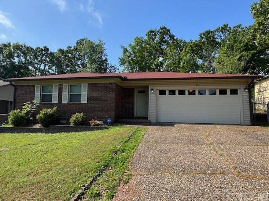 Charming and move-in ready, this well-kept 3-bedroom, 1.5-bath home offers 1,142 sq ft of comfortable living space in a quiet, established neighborhood.   Step inside to a welcoming living area that flows seamlessly into the open dining and kitchen combo—ideal for everyday living and entertaining. Thoughtful updates and neat finishes throughout give the home a fresh, inviting feel.   Outside, enjoy a covered patio perfect for relaxing, along with a chain-link fenced yard that’s great for pets or play. A nice 2-car garage provides ample parking and storage.   A clean, cozy home in a peaceful setting—ready for its next owner. See Agent Remarks.