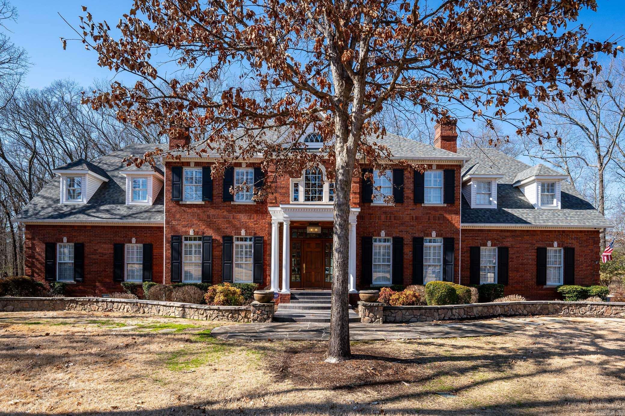 Wonderful Georgian style 6 bed, 5 1/2 bath over 6000 ft.² home nestled on 1.2 aces in Pippinpost. The grand foyer greets you with a beautiful staircase with custom trim work. The spacious main floor includes formal dining, formal living, family room w/built-ins, and sunroom w/vaulted wood ceiling Main level library/office, laundry room, guest bedroom, full & half bath. The chef’s kitchen features, custom cabinetry, large island, granite countertops, stainless steel appliances, walk-in pantry, & adjoining breakfast room w/wet bar. The second level primary en suite features a barrel vaulted ceiling, custom wood floors. Updated primary bath, soaking tub, double vanities, marble shower w/multiple jet sprays. Three closets, including 2 custom built & one cedar closet. There are also 3 large second floor, en suite bedrooms w/large vanities, showers & walk-in closets & a craft room. The exterior features extensive landscaping, covered porch, composite deck, flagstone patio, natural gas, fire pit, & a grill deck. New roof, 3 car garage with heated & cooled shop.