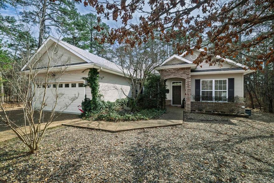 Experience effortless one-level living in this classic brick and siding home, perfectly situated on a quiet, wooded lot steps away from Lake Balboa. Perfect area for long walks in nature. The interior features an expansive open floor plan with lots of windows that take advantage of the beautiful surroundings. Home office and Arkansas room add versatility to this smart floorplan. Whether you’re hosting friends or enjoying a quiet morning overlooking the forest, this home offers the peace you’ve earned with the amenities of Hot Springs Village just minutes away. Best of Village Life You’re not just buying a home; you’re gaining a lifestyle. Located just minutes from championship golf, pristine lakes, and miles of hiking trails, this property puts the very best of Hot Springs Village amenities at your fingertips while maintaining the quiet privacy you’ve earned. Agents see remarks.