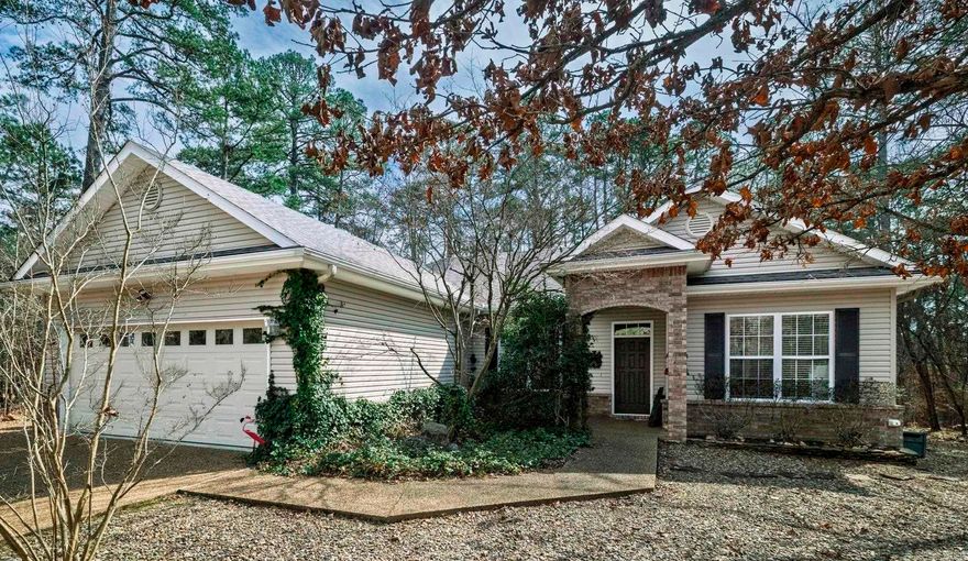 Experience effortless one-level living in this classic brick and siding home, perfectly situated on a wooded lot steps away from Lake Balboa. Perfect area for long walks in nature. The interior features an expansive open floor plan with lots of windows that take advantage of the beautiful surroundings. Home office could easily convert to a 3rd bedroom. Arkansas room allows you to enjoy the outdoors year round. Whether you’re hosting friends or enjoying a quiet morning this home offers the peace you’ve earned with the amenities of Hot Springs Village just minutes away. Best of Village Life You’re not just buying a home; you’re gaining a lifestyle. Located just minutes from championship golf, pristine lakes, and miles of hiking trails, this property puts the very best of Hot Springs Village amenities at your fingertips while maintaining the quiet privacy you’ve earned. Agents see remarks.