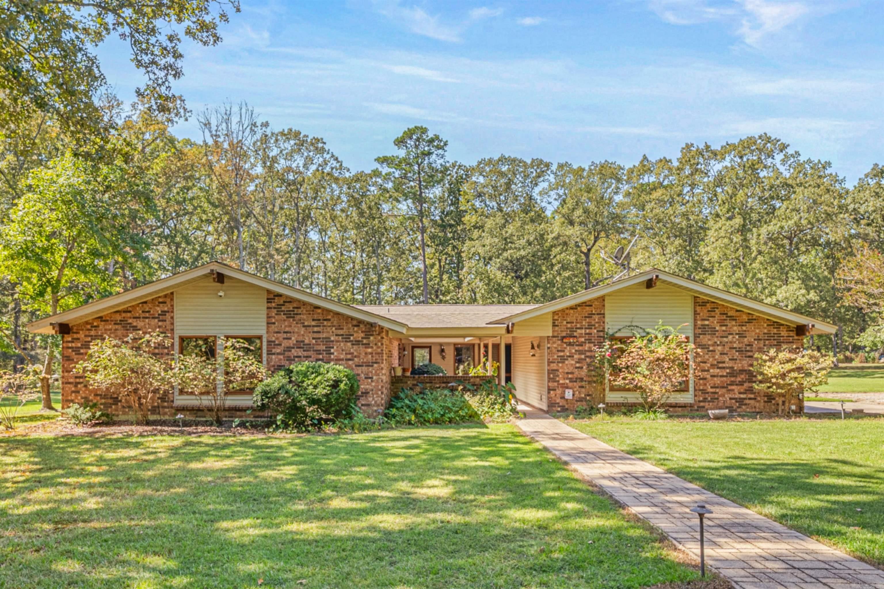Welcome to this beautifully maintained 3-bedroom, 2.5-bath home offering 2,555 sq. ft. of living space on just under 5 acres. This one-owner property features spacious rooms and a thoughtful layout designed for comfort and functionality. Updates include a newer roof, hot water heater, dishwasher, and refrigerator. Enjoy the outdoor lifestyle, lounging in the private pool or under the covered outdoor living area as you watch the hummingbirds and other wildlife that frequent the property. Additional highlights include a sauna, cedar-lined storage closet, sprinkler system, generator hook-up, and a nice storage shed for tools or equipment. This well-cared-for property offers the perfect blend of privacy and space—ready to welcome its next owner. Call today for your private showing!