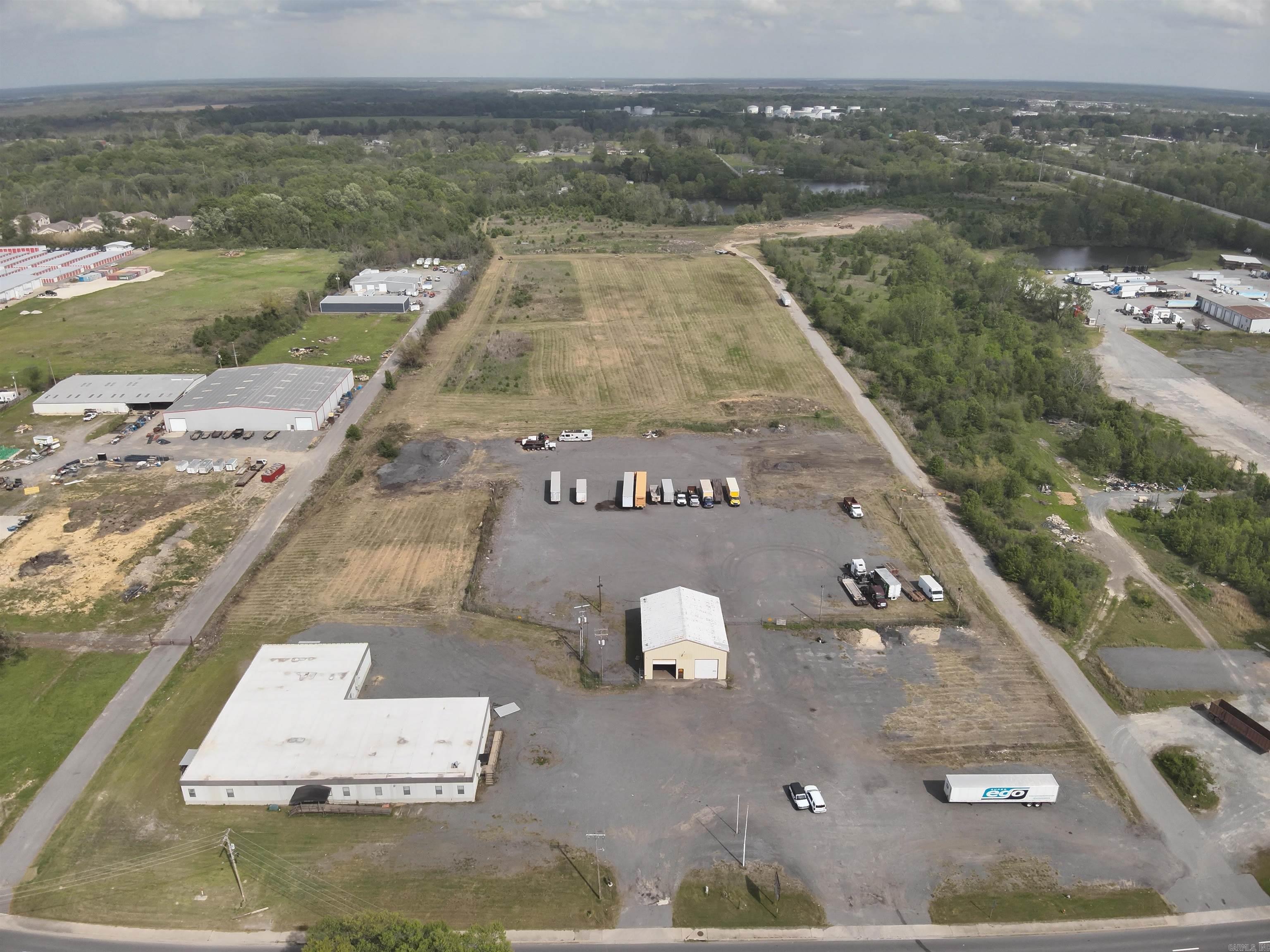 Exciting industrial opportunity with 48 acres zoned C3 and I2 industrial in North Little Rock. Has expansive office over 14000 sq feet with multiple restrooms offices breakrooms and conference rooms. Large shop with industrial fencing. The land has been mostly developed for a large industrial complex. You will have a presence from I40 and can be viewed from the millions of travelers using the main interstate coming through our great state. Frontage on Highway 161 with multiple large business's surrounding this great property.