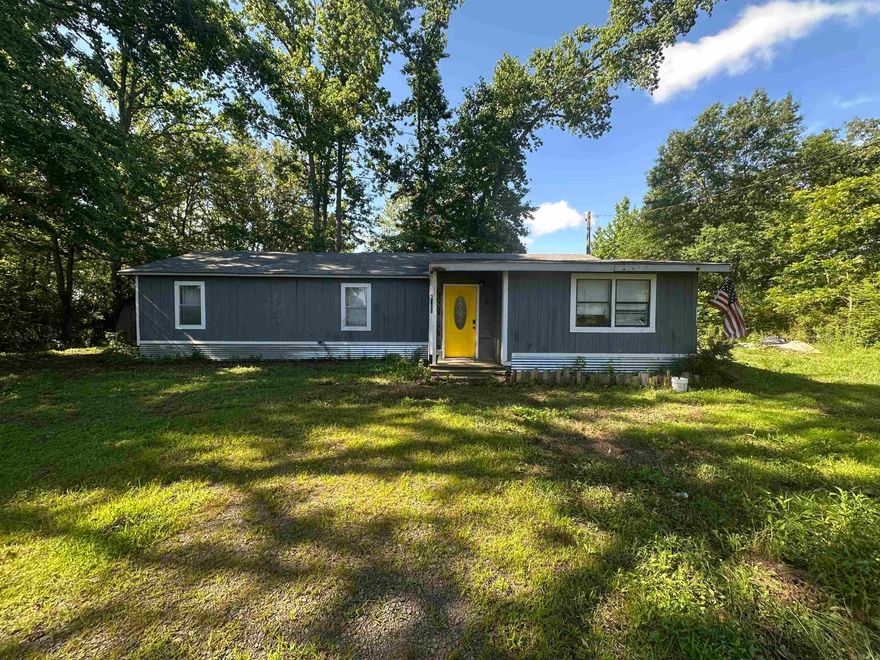 Home for sale with the land behind it, good acreage and room in back yard. Home being sold AS-IS, no property disclosure available.