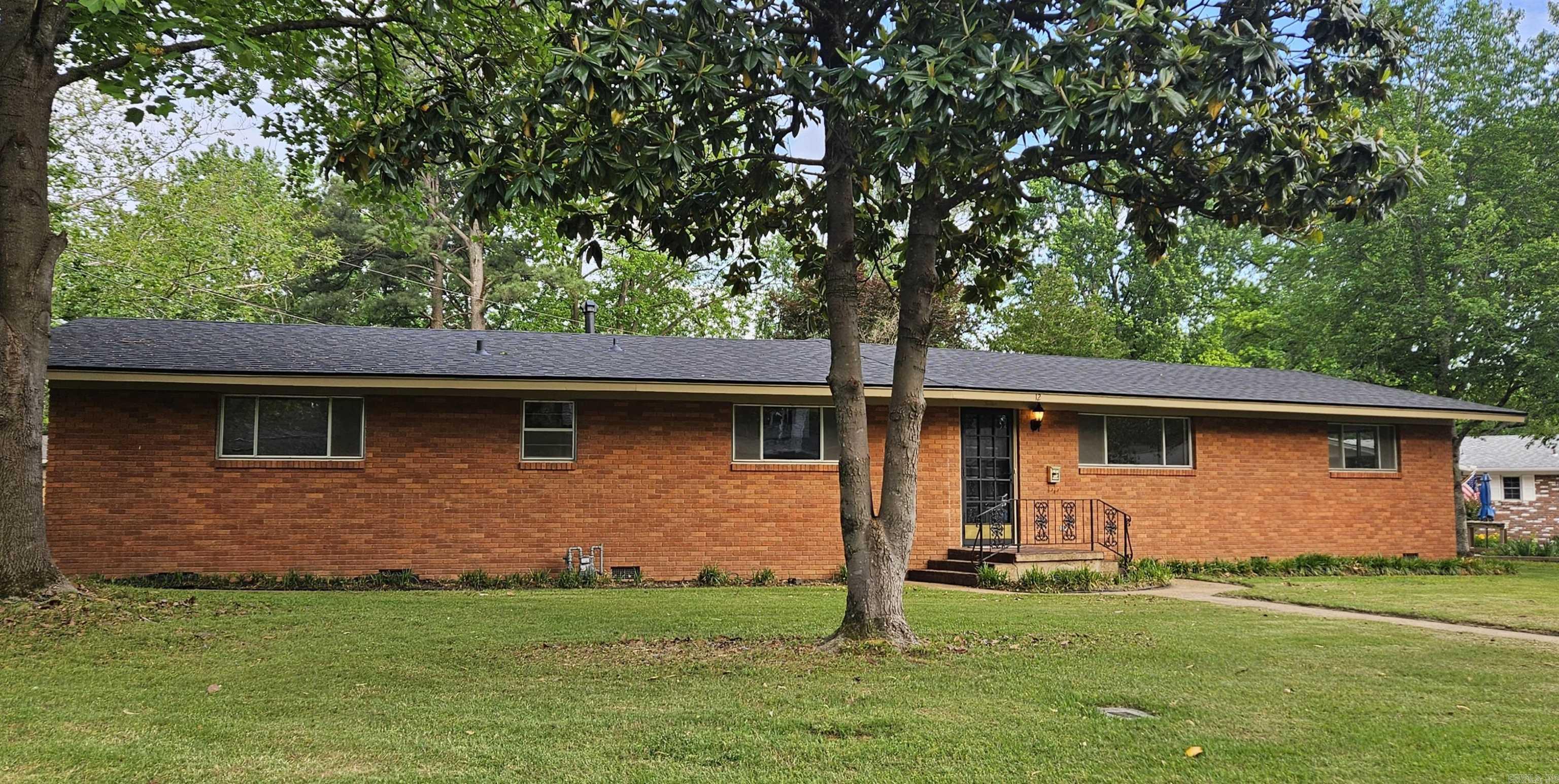 Custom built spacious home on the West side of town in Lambert Terrace close to the high school. New architectural shingle roof, all new interior and exterior paint. Original hardwood floors were refinished. Some new electrical to include all new outlets and light switches. Some new light fixtures. In the Kitchen it has a New stainless-steel dishwasher, deep sink and black faucet. All new mate black hardware, doorknobs and hinges. Central heat and air unit replaced about 5 years ago and recently serviced. Entire duct work was just replace including floor registers and complete new moister barrier was installed at the same time. Formal living room. large dining area with vaulted ceilings. The den has a fireplace that was converted to gas logs. The 4th bedroom is small and would make a nice nursery or office. Storm shelter and storage building located in the back yard. Take a look at this beautifully updated home today!