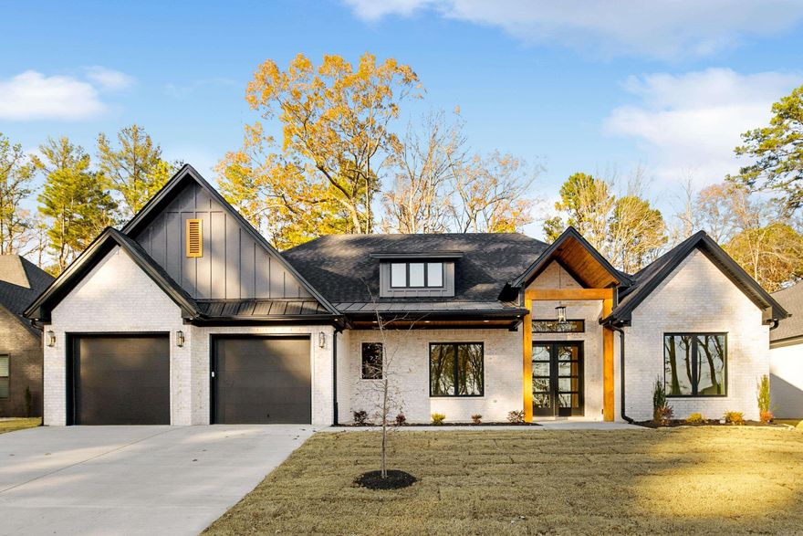 Show stopping NEW construction in Severn Landing at Hurricane Lake Estates!    This beautiful property features four spacious bedrooms, three FULL bathrooms, and an office equipped for a possible fifth bedroom. Finishes include real hardwood flooring, custom cabinets, quartz countertops, and stylish lighting throughout.   The cozy electric fireplace adds charm, while the primary suite boasts a walk-in closet and a bathroom with a walk-in shower and soaking tub. The primary closet is chef's kiss!  Set on a flat lot, this home is part of a fantastic community with a clubhouse, tennis court, swimming pools, and playgrounds. This home is not your average spec house!