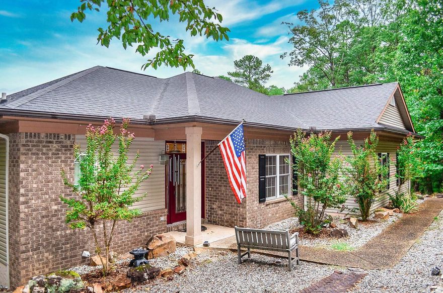 Your perfect second home awaits in Hot Springs Village! This beautifully furnished 3-bedroom, 2.5-bath retreat offers picture-perfect views of the Ouachita foothills, a 2-car garage, and laminate floors throughout. The inviting layout includes granite countertops, formal dining, a breakfast bar, and an open living/dining area. Step outside to a partially covered upper deck—an ideal spot for relaxing or entertaining, and a BIG plus for enjoying the view in any weather. The walk-out lower level is great for hosting guests, featuring a spacious great room, two bedrooms, a full bath, and a convenient kitchenette. Relax, entertain, and enjoy the slower pace—just minutes from golf, lakes, and scenic trails. No Seller Property Disclosure available. Agents, please review showing and agent remarks.