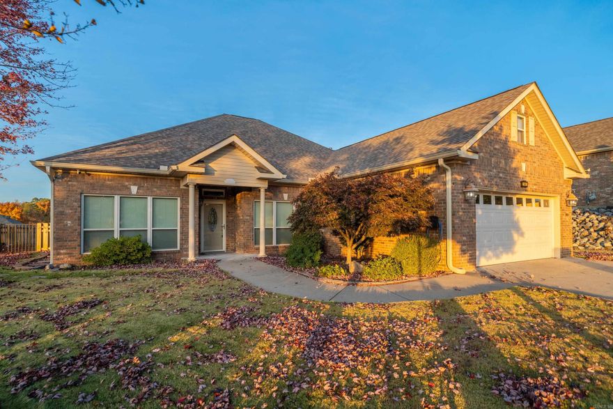 Beautiful home in Forest Lakes Subd. This one has it all! Large corner lot with 3 bedrooms, 2 baths plus, sunroom, separate dining area, office space and a bonus room! Open kitchen/living room with vaulted ceilings and large kitchen island. Kitchen offers granite countertops, tons of cabinets and newer stainless steel appliances. Gas log fireplace in living room with solid surface flooring. Floor to ceiling windows in sunroom offering plenty of natural light and would make a great second living space or den area. Office is off sunroom with gaslog fireplace. Tray ceilings in master bedroom with double vanity, large walk in tile shower and double closets. Private outdoor space with decks, a beautiful gazebo and fully fenced back yard. Don't miss the stairs to bonus room in garage. Navien on demand hot water tank, new ac in 2022 and new roof in 2024. This home is very well maintained and ready for new owner! Forest Lakes subd. is a 55+ community centrally located in Hot Springs to give you convenience to shopping, restaurants and hospitals. Subdivision offers an amazing club house with exercise room, pool, outdoor kitchen and even a putting green!