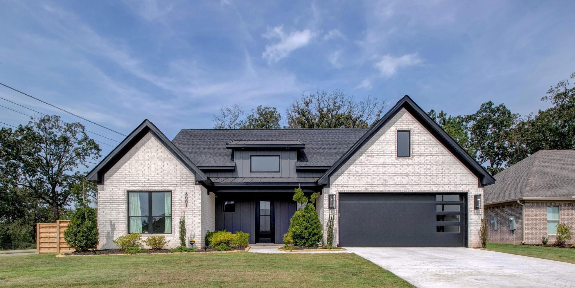 Like-new construction home in Coral Ridge Subdivision. This three bedroom, 2 bath home has all of the extras- 12 foot ceilings in the living spaces, hidden pantry, abundant cabinets and storage, large kitchen island, tongue and groove accents, spa-like bathroom, gas fireplace, an outdoor kitchen area, fully fenced, split floor plan, no carpet, upgraded appliances, and a laundry room that dreams are made of! Zoned for Bryant School District- Springhill Elementary and Bethel Middle School. This home is a must see!