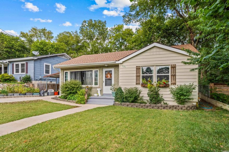 Charming cottage-style home ideally located in the center of town, within walking distance to Oaklawn Casino. Recently remodeled with tasteful updates, this 2-bedroom, 1-bath residence blends character with comfort. Highlights include a newly installed roof, original hardwood floors, a spacious backyard with a covered gazebo, fire pit, carport, and storage shed. A perfect combination of charm and affordability!