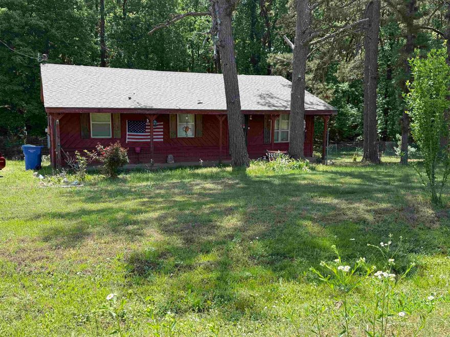 This cute 3 bedroom 1 bath home is nestled on 1.23 acres.  A new roof was just installed in February, tankless water heater is 5 yrs old, seller is leaving the refrigerator and washer and dryer (all 8 yrs old).  The home has a few bonus features including a storm shelter and sunroom.  Call today for your private tour...this one won't last long!