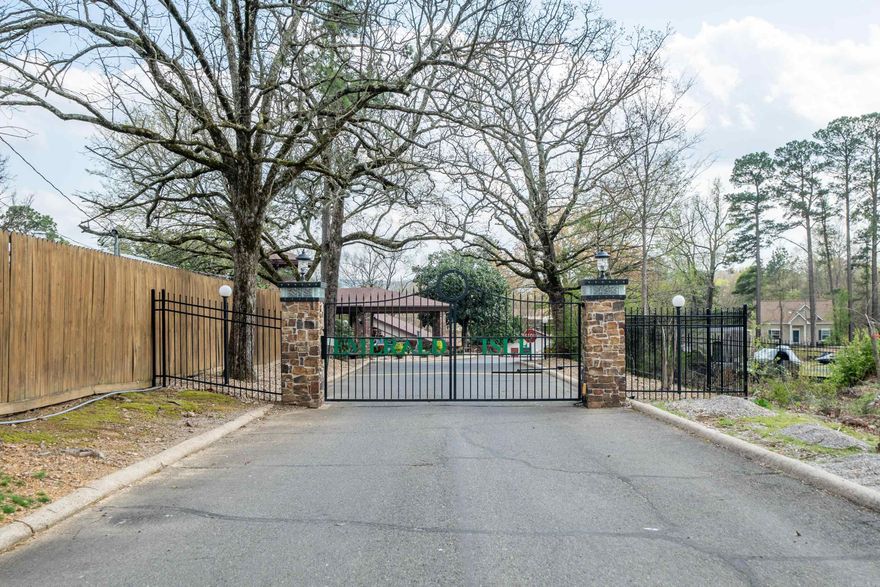 7 South, 7 minutes to Oaklawn in the heart of shopping & dining with the best views on the lake. 2B/2B, new windows & glass doors, walk down a few steps to lake, stone countertops bath & kitchen, Fireplace , wet bar completely furnished 30 day minimum rental .Many amenities on the grounds.