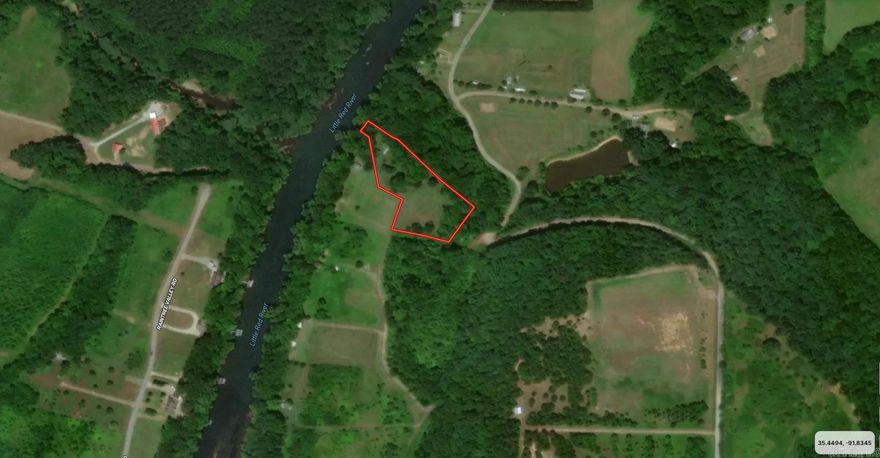 2.41 acres on the Famous Little Red River with well kept mobile home ready for new owners. Good Condition 14x60 mobile home built with 2x6 exterior walls.  Home has a new tin roof and laminent floors