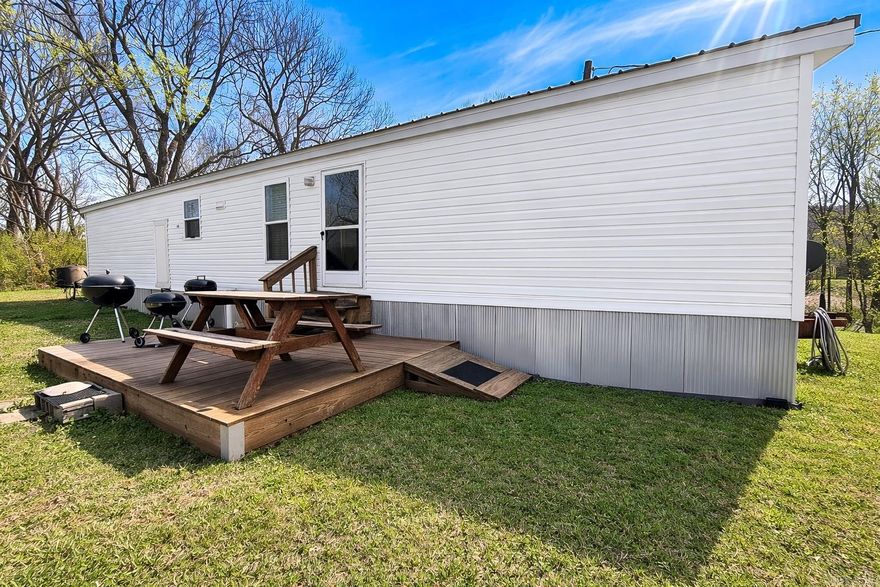 2.41 acres on the Famous Little Red River with well kept mobile home ready for new owners. Good Condition 14x60 mobile home built with 2x6 exterior walls.  Home has a new tin roof and laminent floors