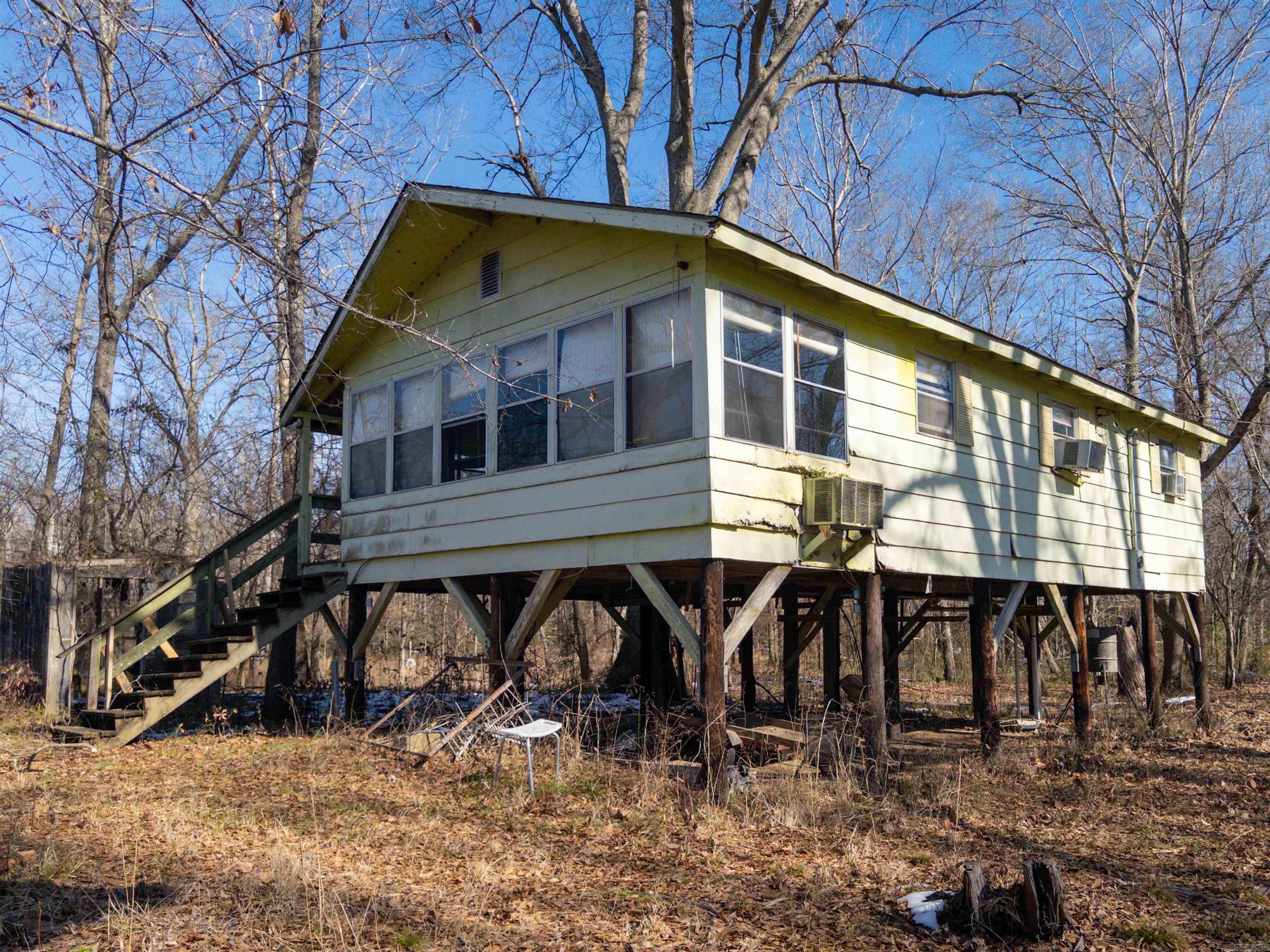 Beautiful Maddox Bay and the Dale Bumpers National Wildlife Refuge are literally right outside of the door of this quaint, elevated cabin on .8 acres. Maddox Bay is a focal point of hunting and fishing in the heart of the Flyway. The Bay is well known to outdoorsmen as one of the best places to hunt and fish in Arkansas. It is the most famous oxbow on the lower White River, and offers direct access to the White River much of the year. Further, the Bay is surrounded by the 160,000 Dale Bumpers National Wildlife Refuge and is a short drive from the Cache, Arkansas, and Mississippi Rivers. The property features water frontage and an elevated 640 square foot cabin for the outdoor enthusiast.