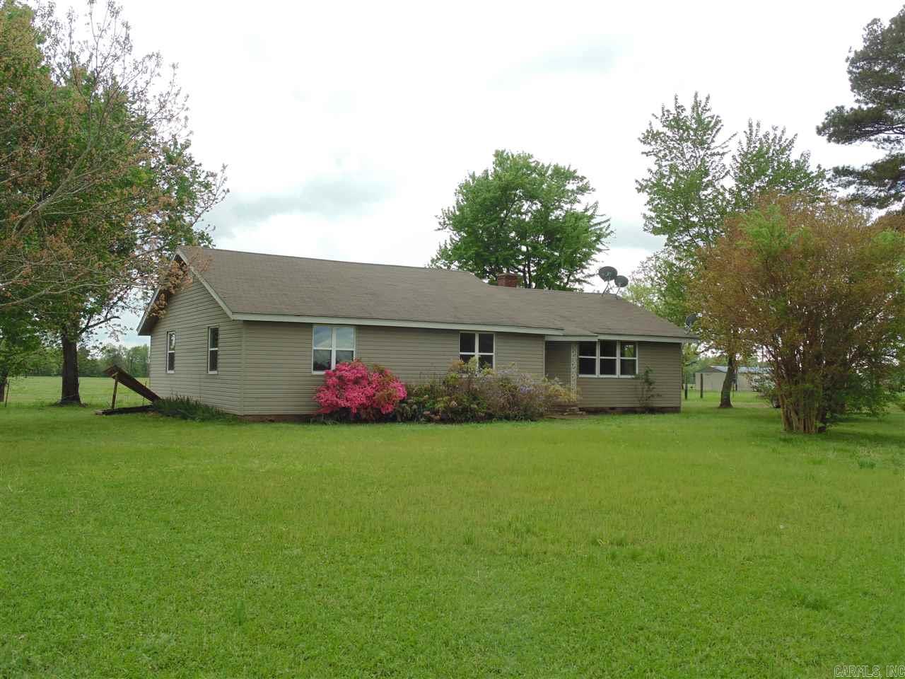 WONDERFUL PLACE TO CALL HOME!! This home sits on 3 acres surrounded by pasture land and has lots of privacy. This home offers a huge living/formal dining area and oversize kitchen with ample amount of cabinets, NEW RANGE & DISHWASHER plus this room also offers a space for den/dining area. NEW WINDOWS & WATER HEATER will help on your utility cost. There is a 50 ft easement on east side of property. Owner has priced this far below previous appraisal price and has added all new items above since appraisal