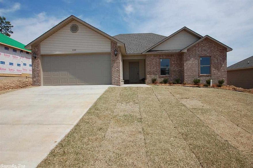 Brand New Construction in Benton Schools!! This Home features an Open Floor Plan w/ 10' Ceilings in the Great Room, Beautiful Kitchen w/ Dark-Stained Cabinets & Modern Counters, 19" Tile Floors, Split Bedroom Plan, Master w/ Great Bath boasting a Jetted-Tub & Separate Shower! Covered Back Patio. Established Neighborhood. Curb & Gutter Streets. Located 1.5 Miles from the New Benton Town Center! Qualifies for 100% Financing through Rural Development! Open House Every Sunday 2-4! Come See Us!