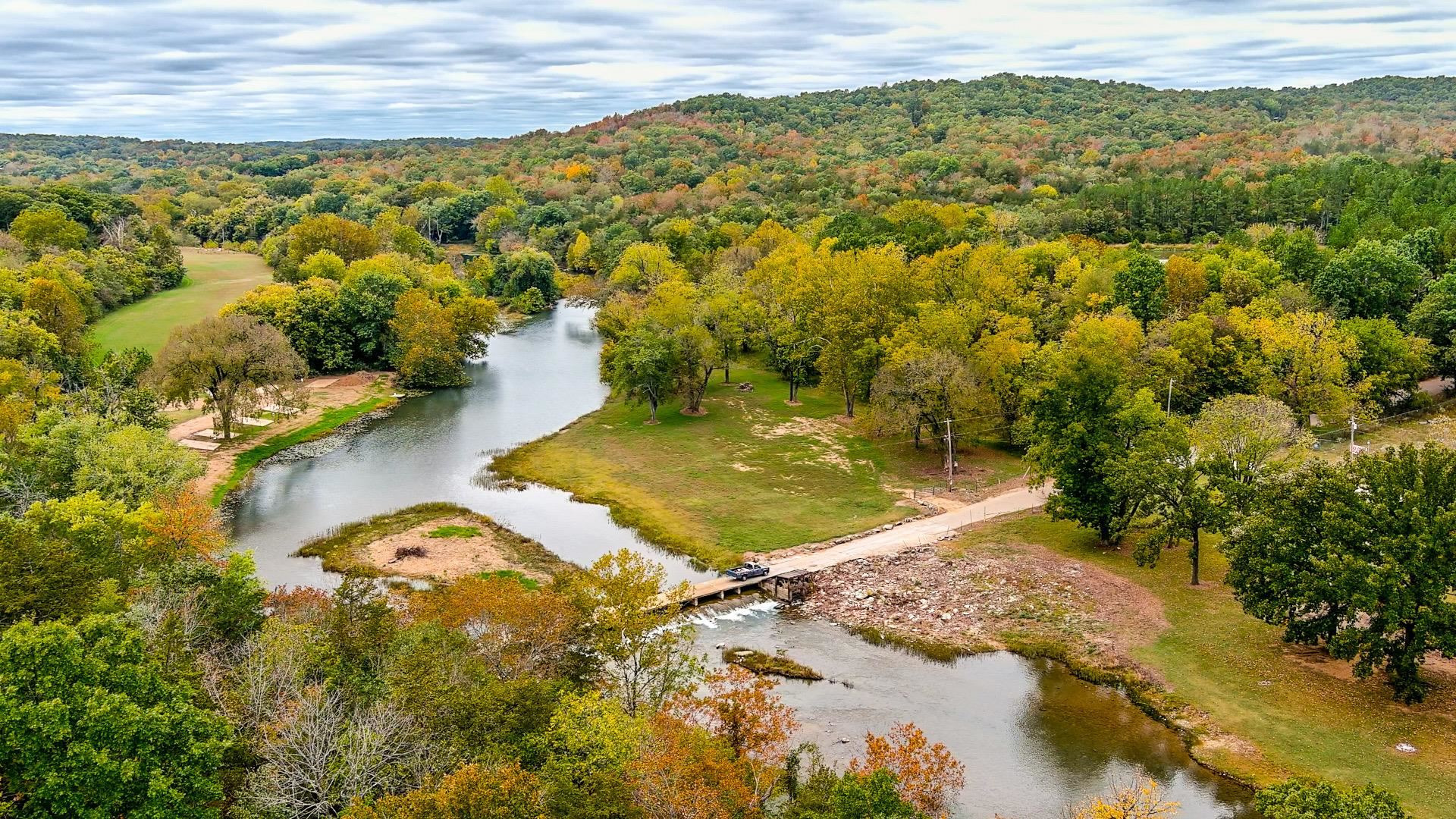 Looking for a river front lot to call your own? This grassy river front spot could be the one! Perfect to gather and camp. Put in upriver and float right to your own piece of property. Utilities near by. 6 lots available in this area starting at $29,900. Call to take a look today!